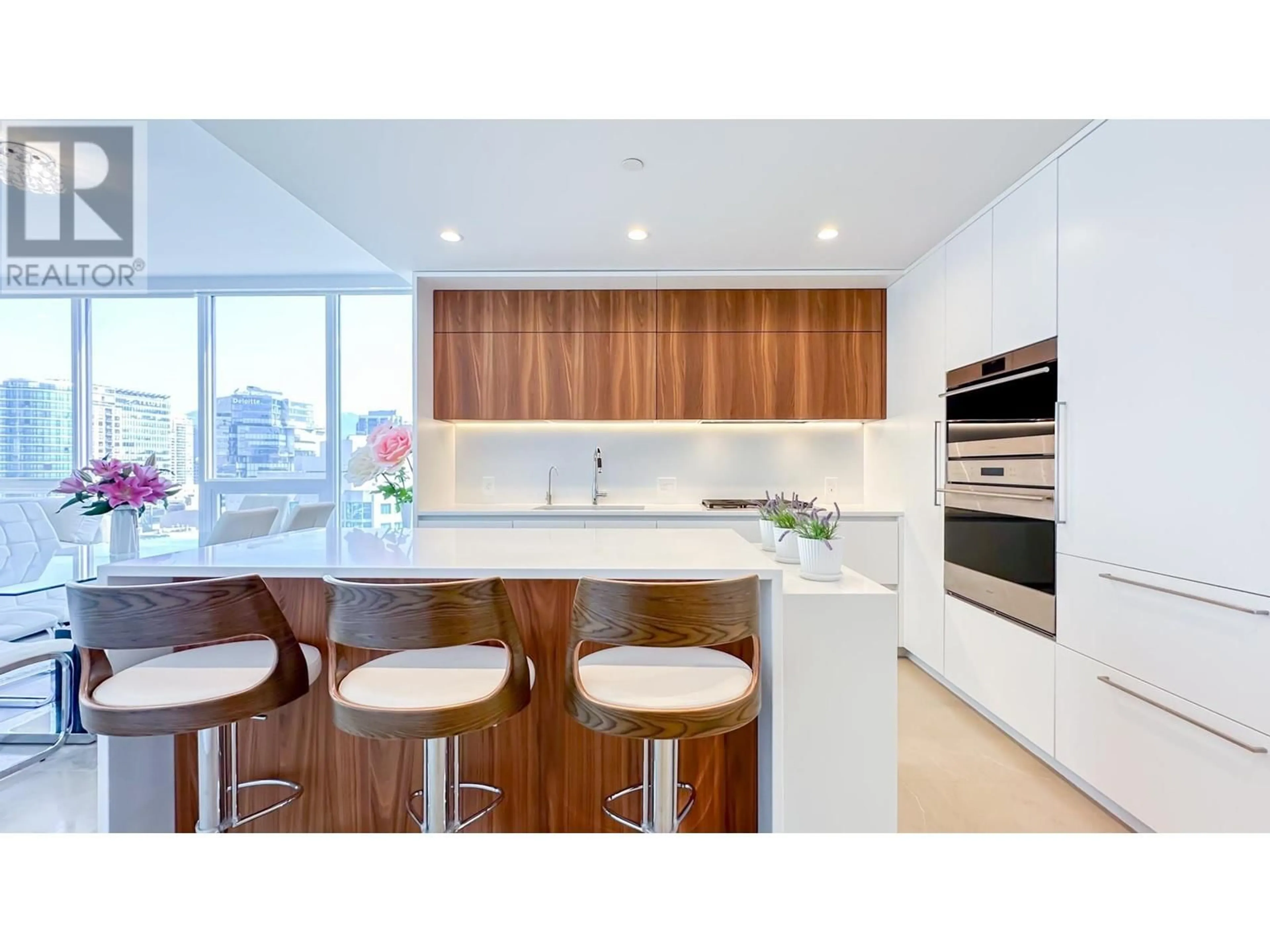 Contemporary kitchen, wood/laminate floor for 2301 - 885 CAMBIE STREET, Vancouver British Columbia V6B0R6