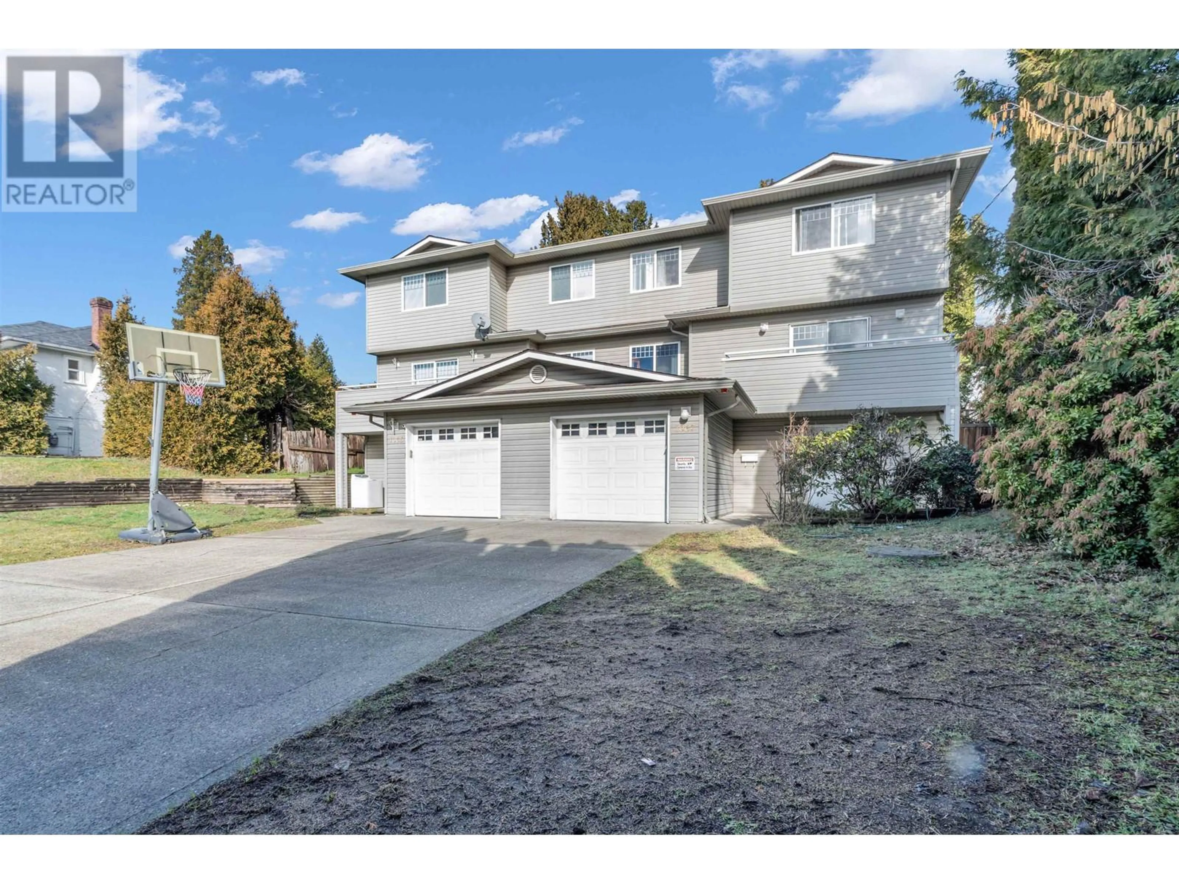 A pic from outside/outdoor area/front of a property/back of a property/a pic from drone, street for 1067 DANSEY AVENUE, Coquitlam British Columbia V3K3H2