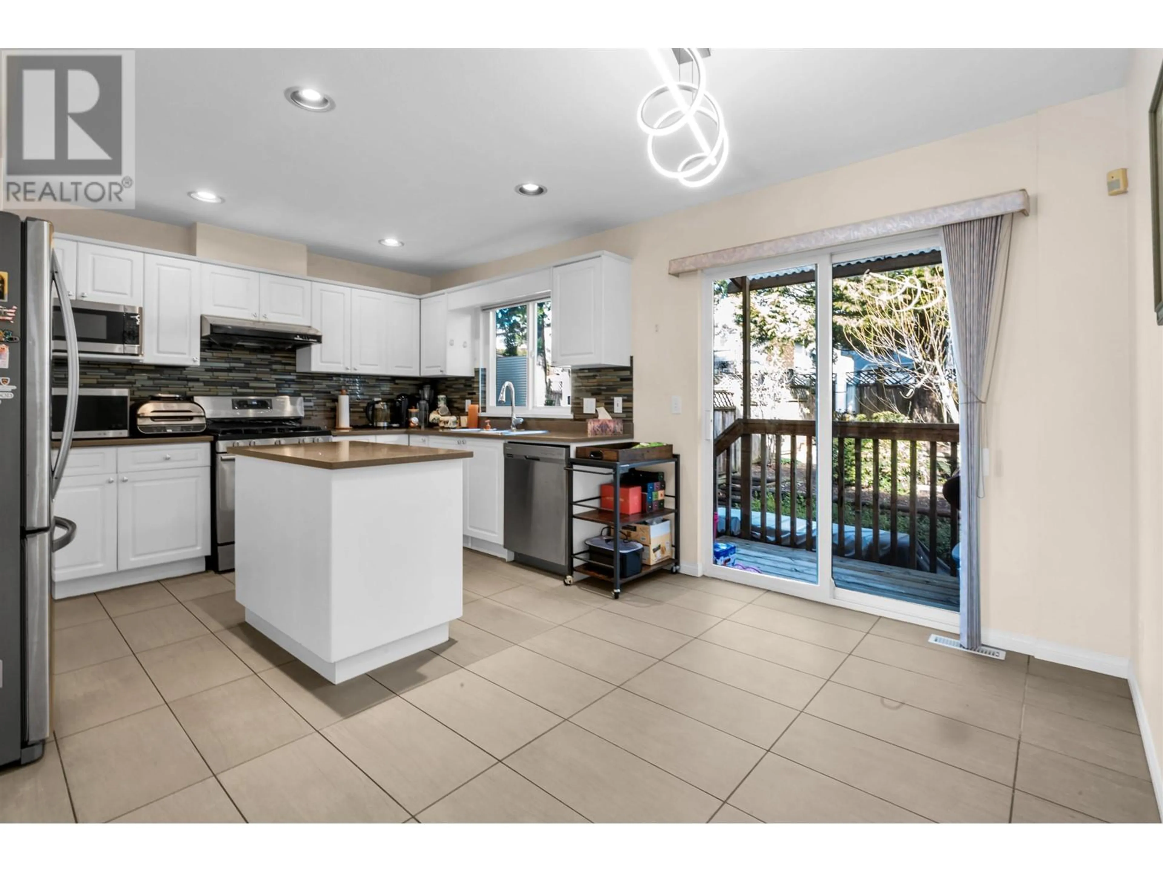 Open concept kitchen, ceramic/tile floor for 1067 DANSEY AVENUE, Coquitlam British Columbia V3K3H2