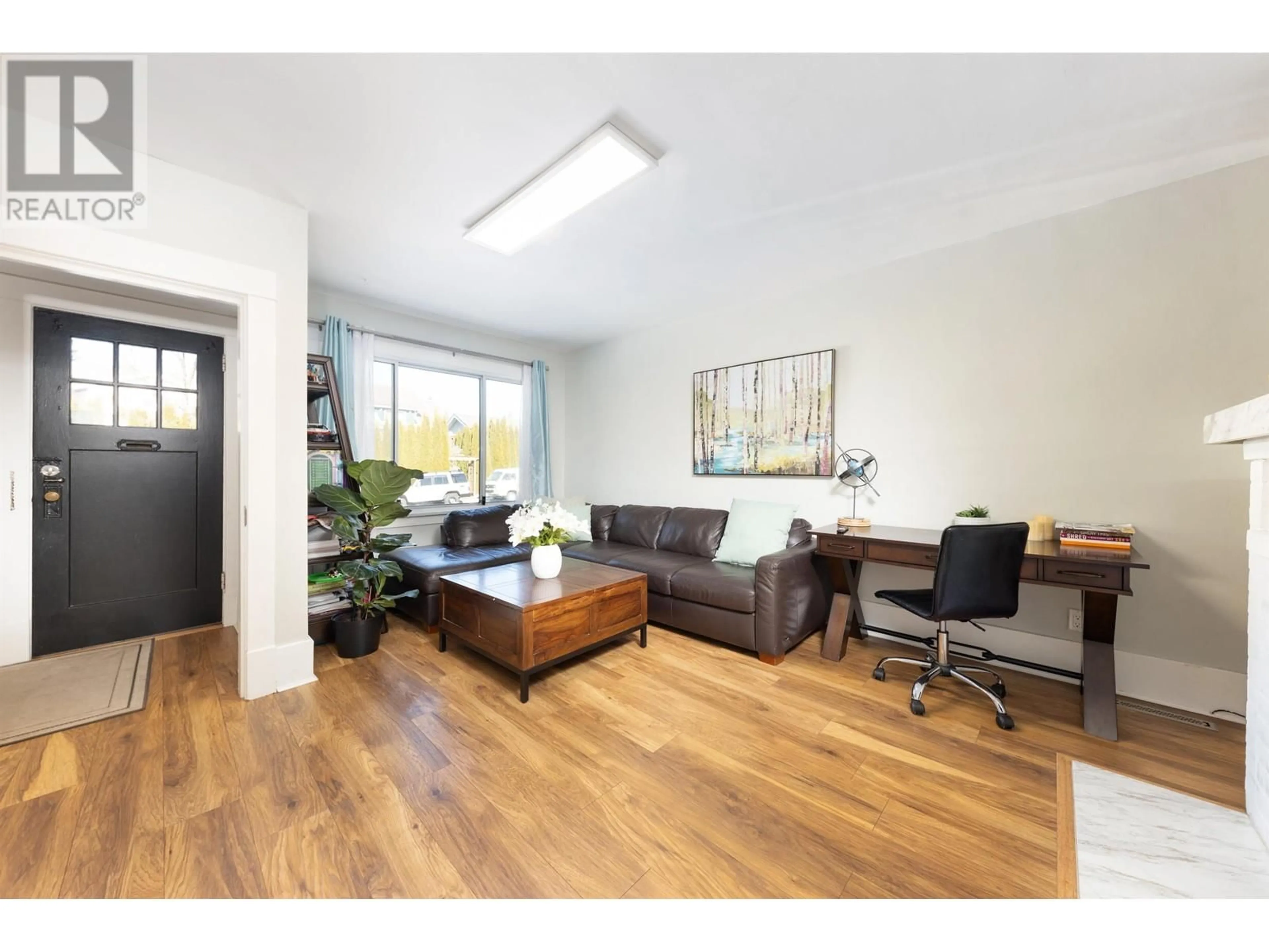 Living room with furniture, wood/laminate floor for 3628 W 5TH AVENUE, Vancouver British Columbia V6R1S2