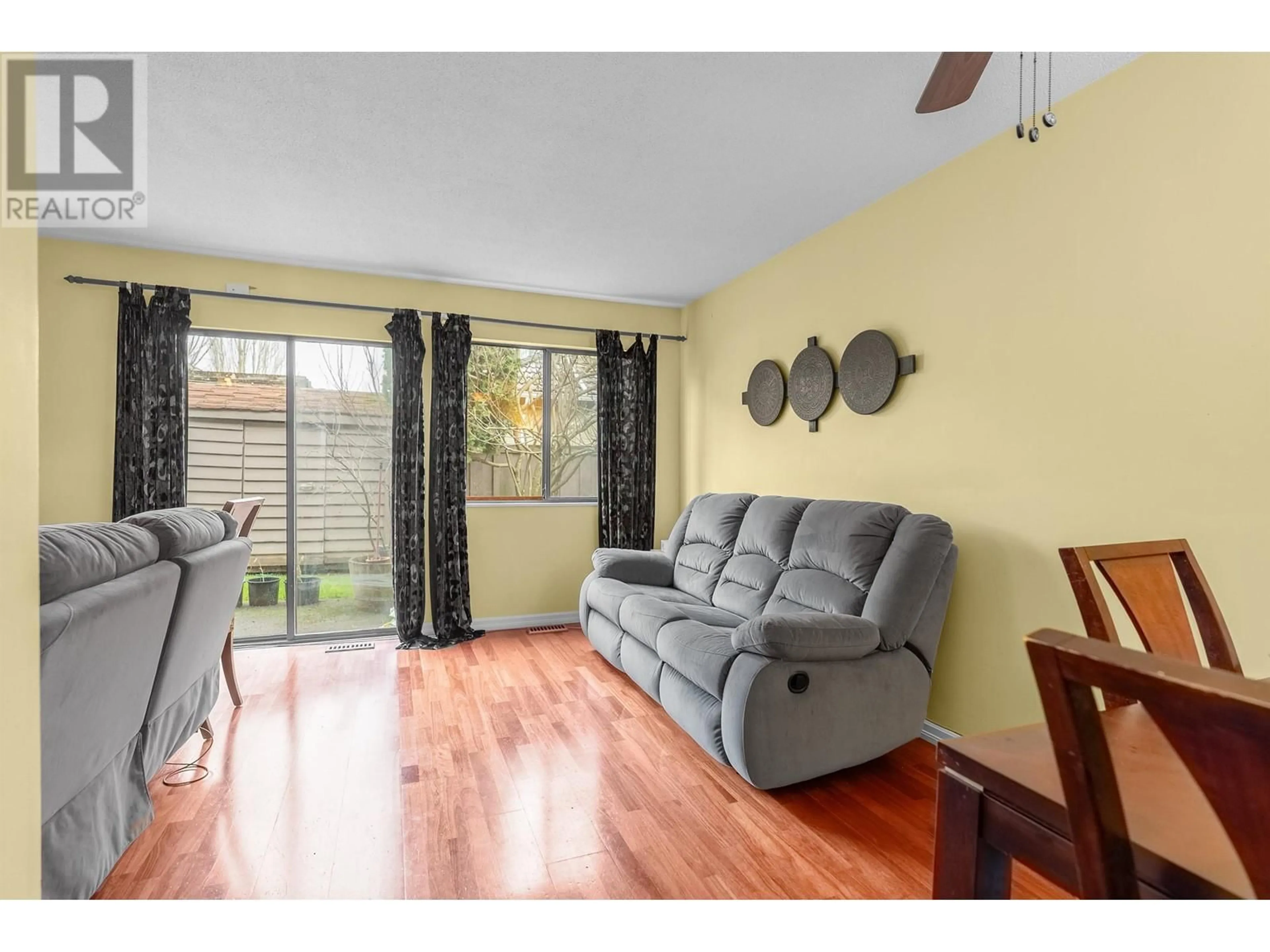 Living room with furniture, wood/laminate floor for 9 10111 GILBERT ROAD, Richmond British Columbia V7E2H2