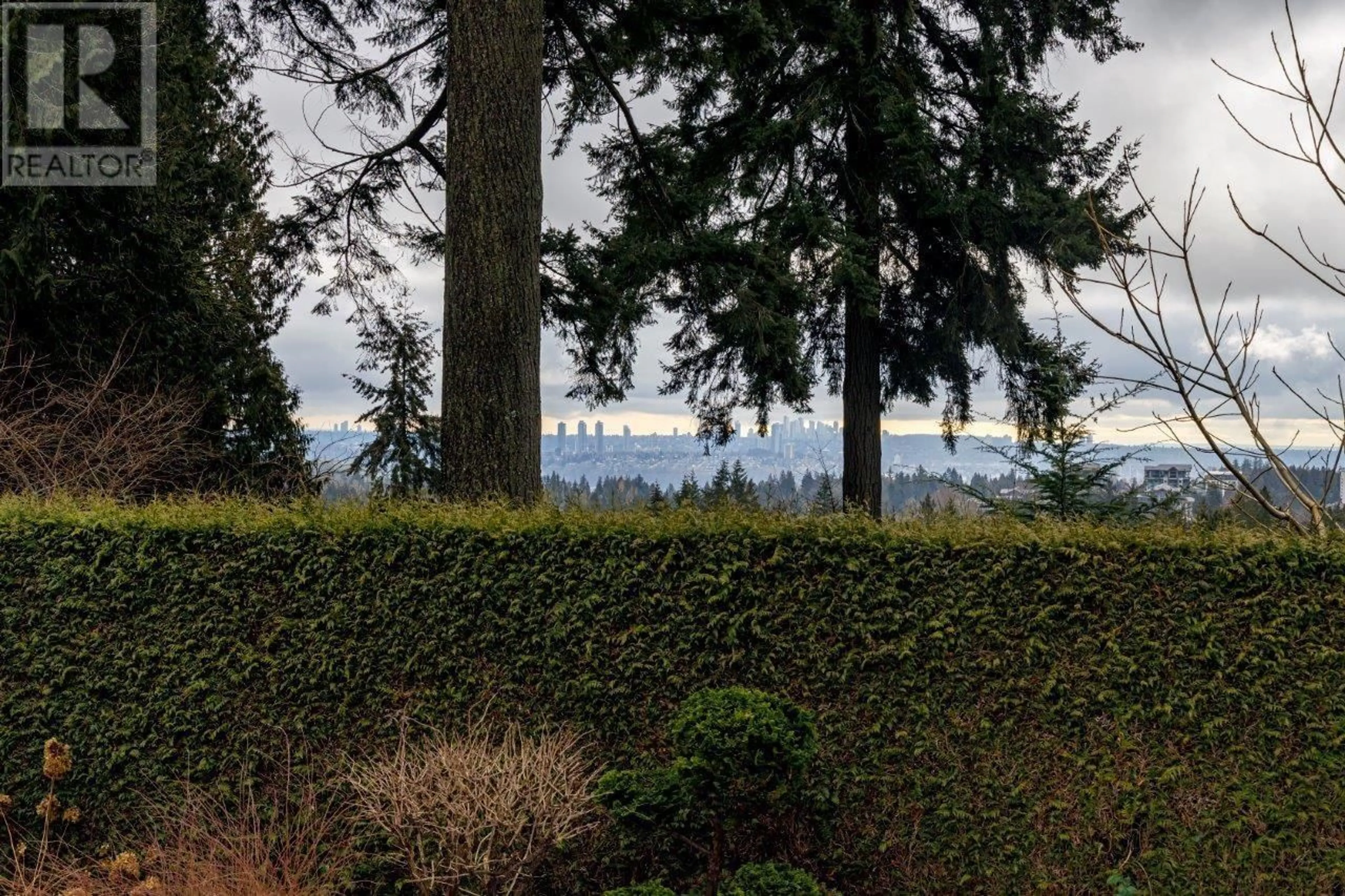 A pic from outside/outdoor area/front of a property/back of a property/a pic from drone, forest/trees view for 1185 DYCK ROAD, North Vancouver British Columbia V7K3C4