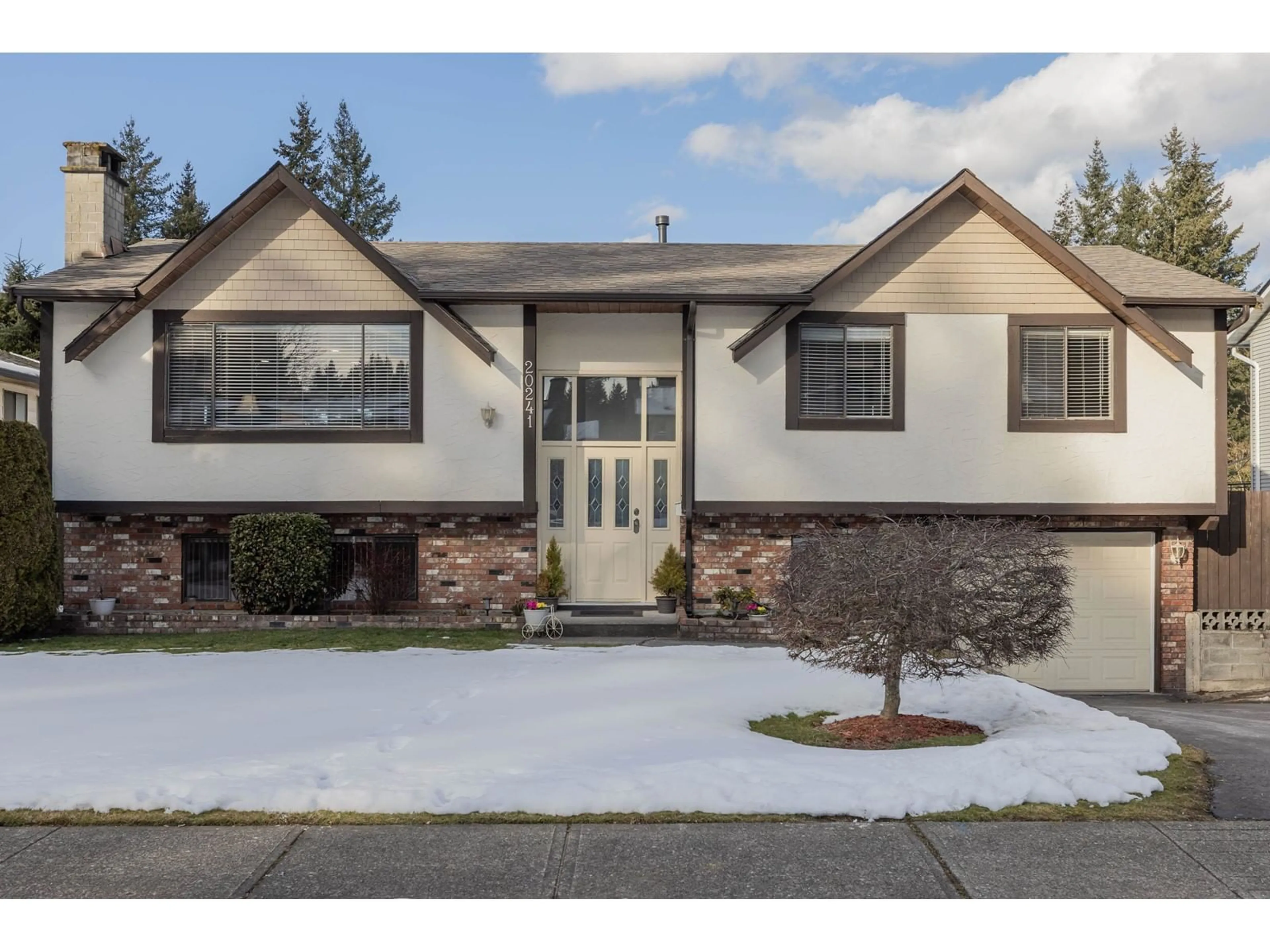 Home with vinyl exterior material, street for 20241 47A AVENUE, Langley British Columbia V3A5K9