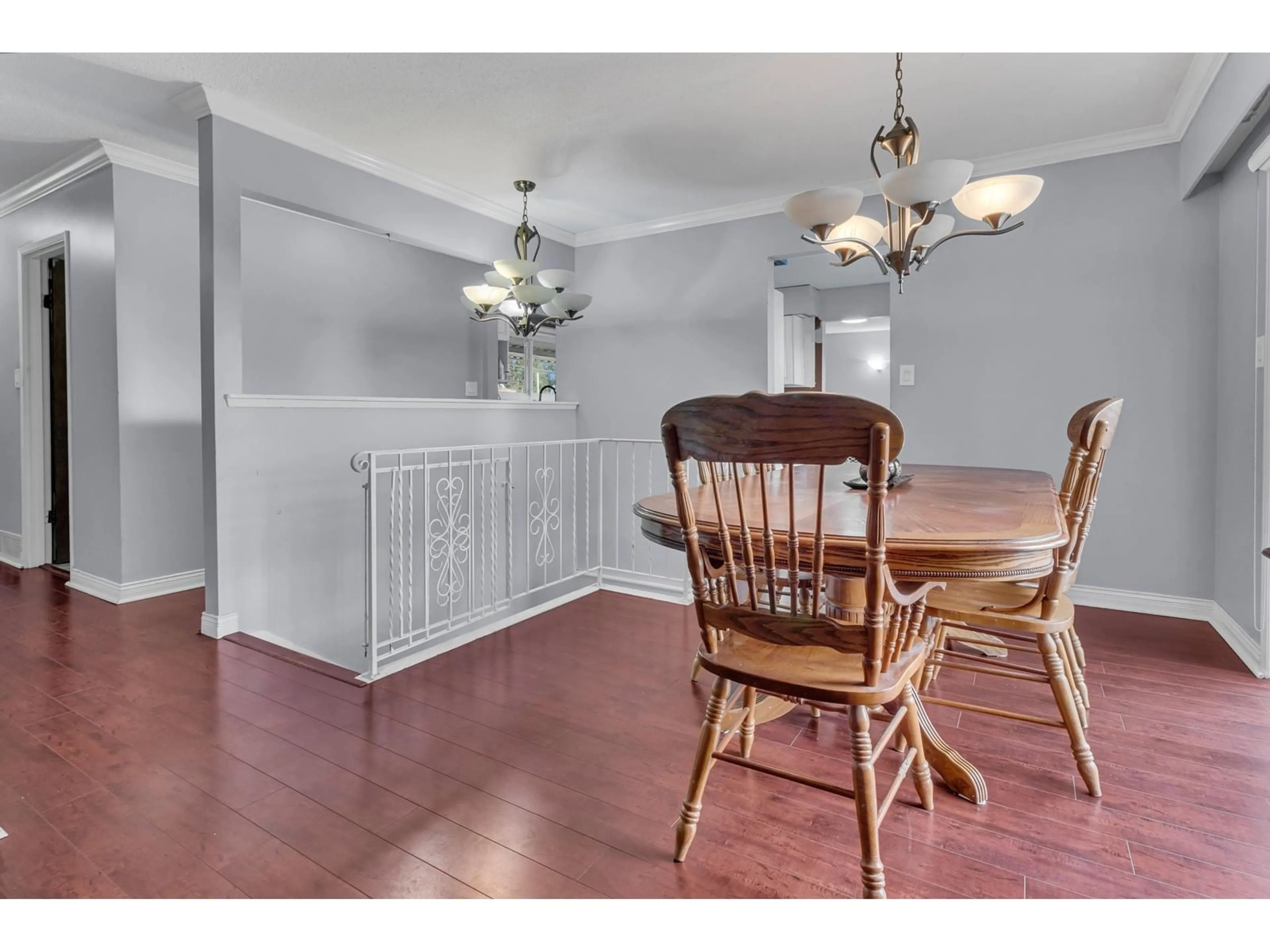 Dining room, wood/laminate floor for 7672 115A STREET, Delta British Columbia V4C5R2