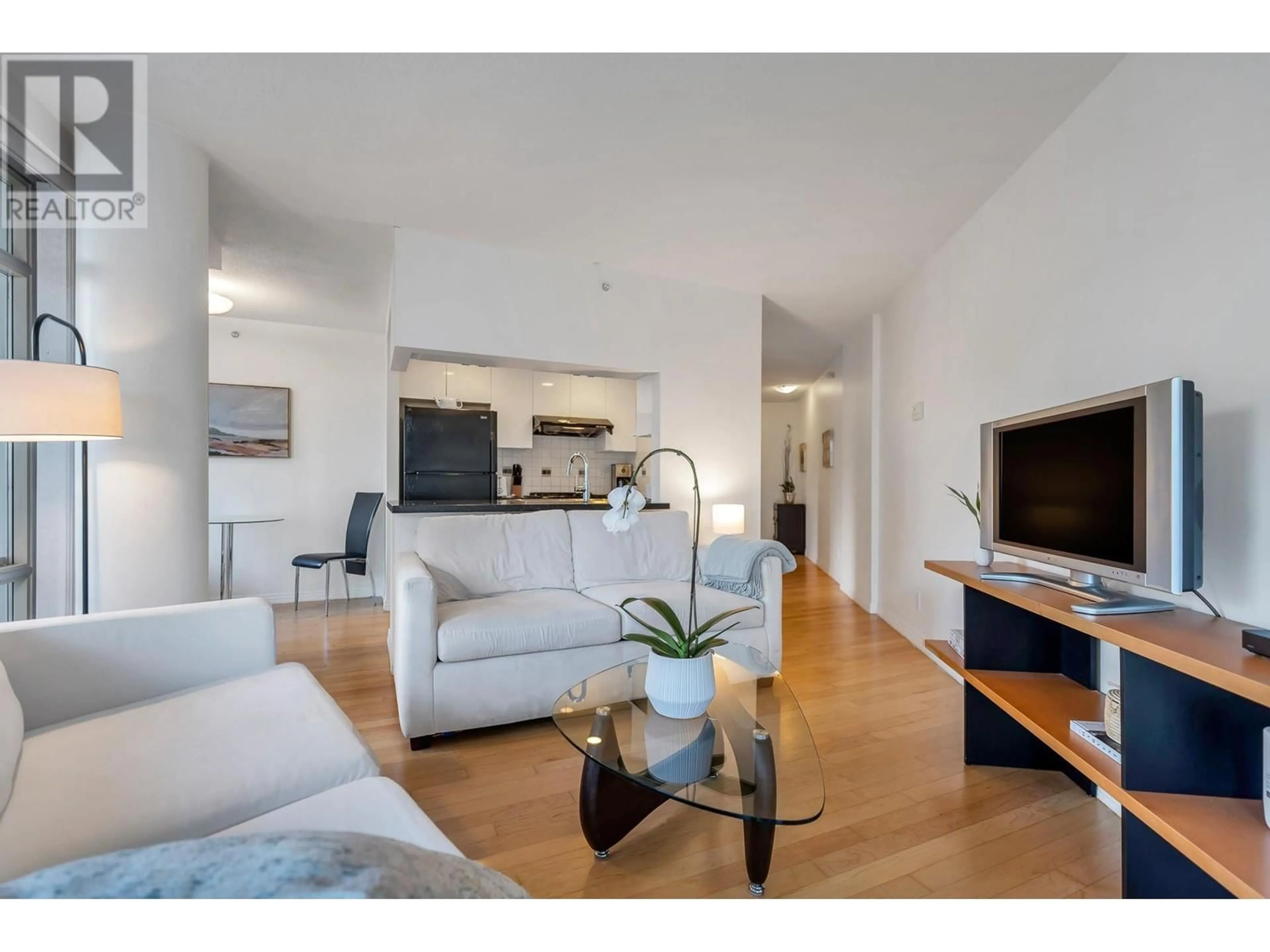 Living room with furniture, wood/laminate floor for 601 189 DAVIE STREET, Vancouver British Columbia V6Z2X9