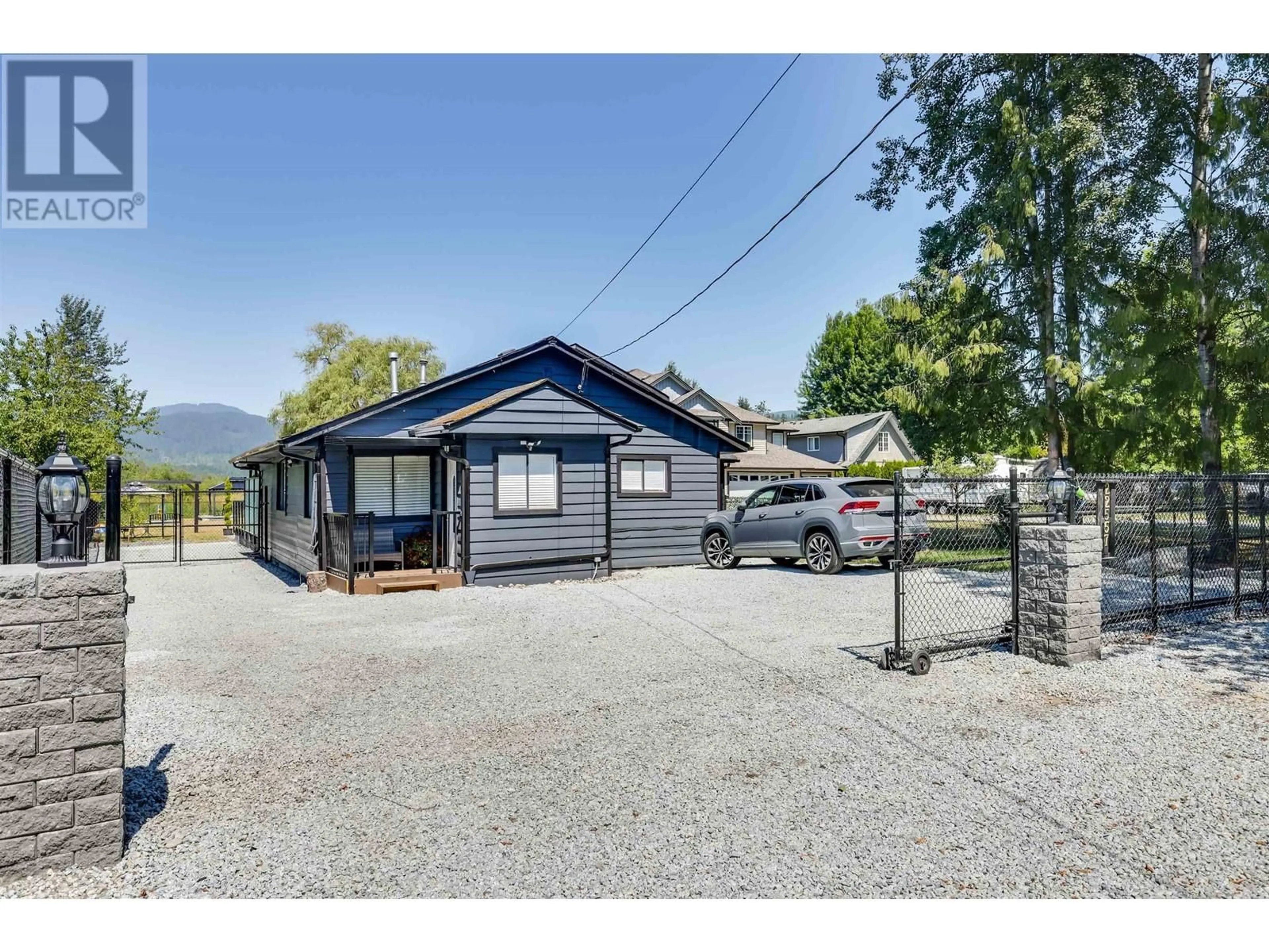 A pic from outside/outdoor area/front of a property/back of a property/a pic from drone, street for 22557 136 AVENUE, Maple Ridge British Columbia V4R2P7