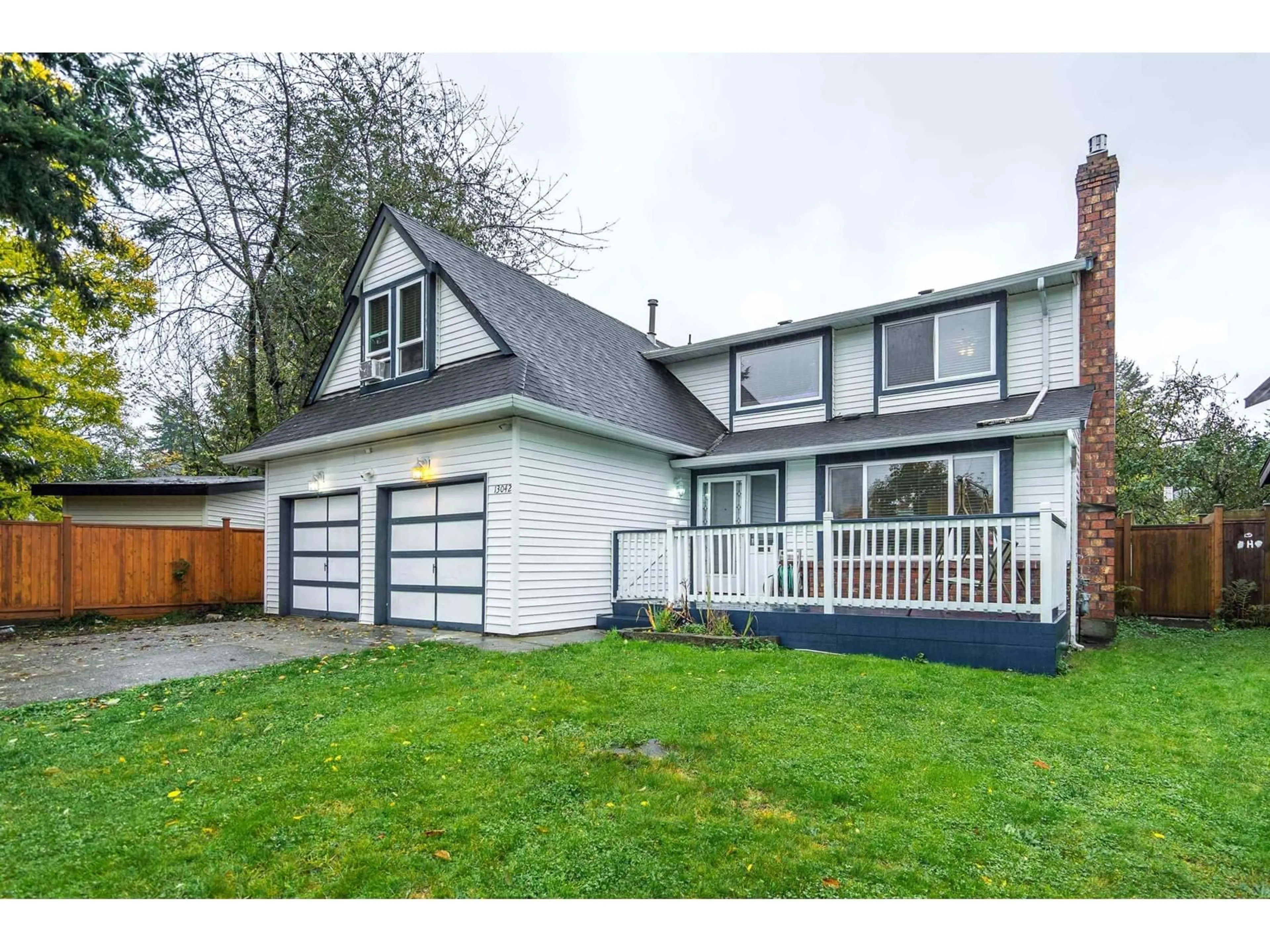 Home with vinyl exterior material, street for 13042 62 AVENUE, Surrey British Columbia V3X2G3