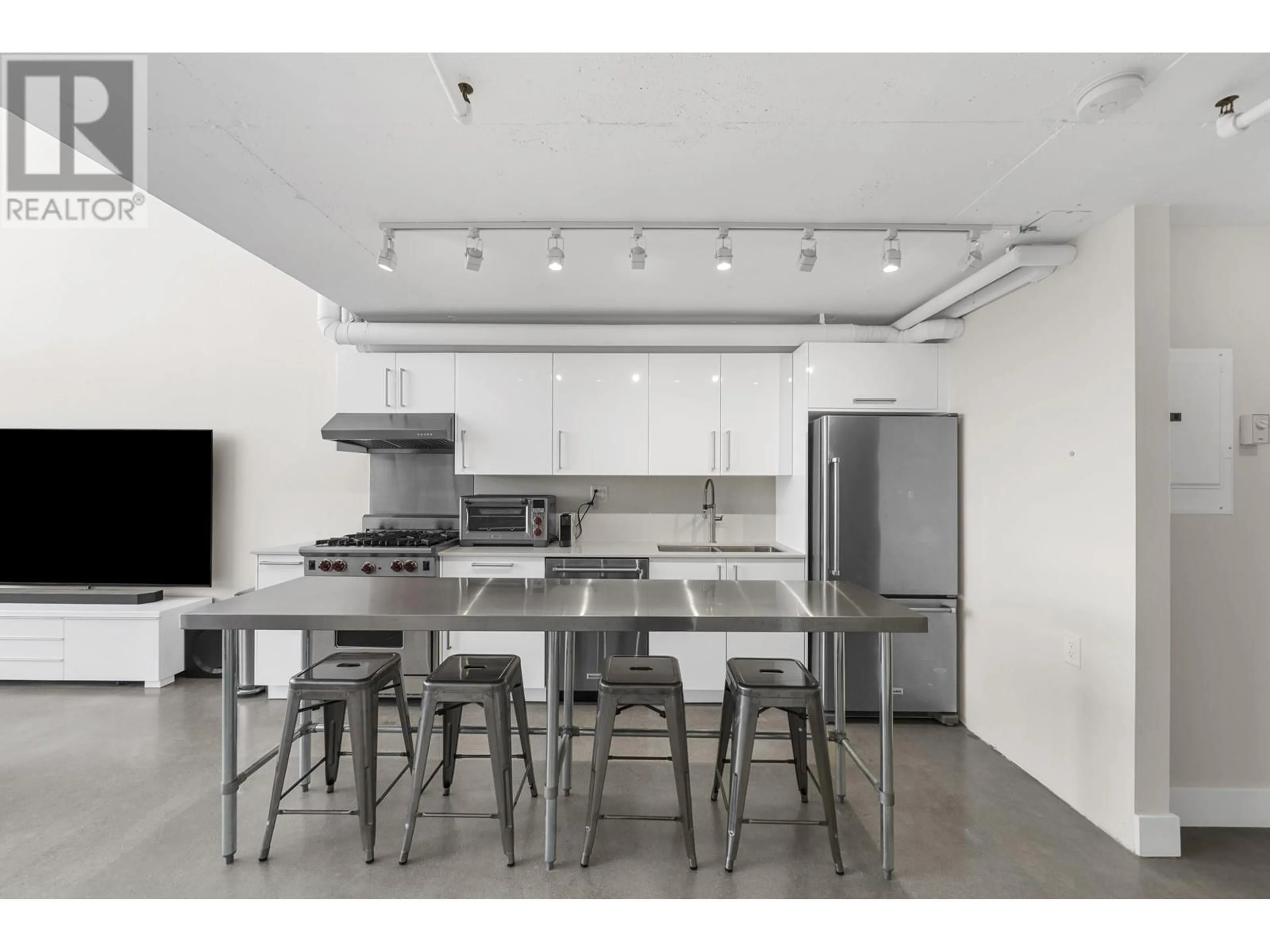 Open concept kitchen, unknown for 1007 289 ALEXANDER STREET, Vancouver British Columbia V6A4H6