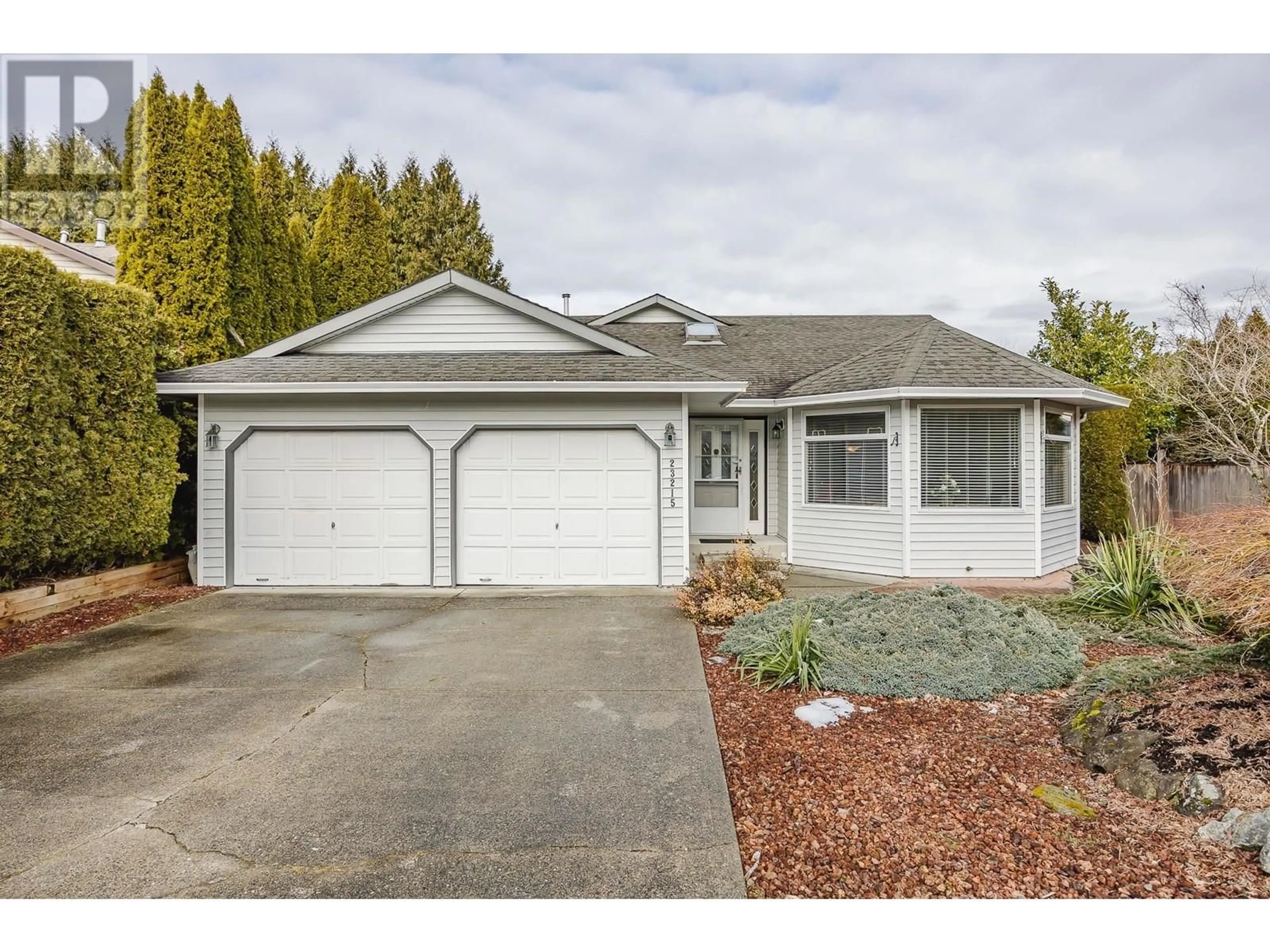 Home with vinyl exterior material, street for 23215 122B AVENUE, Maple Ridge British Columbia V2X0R2