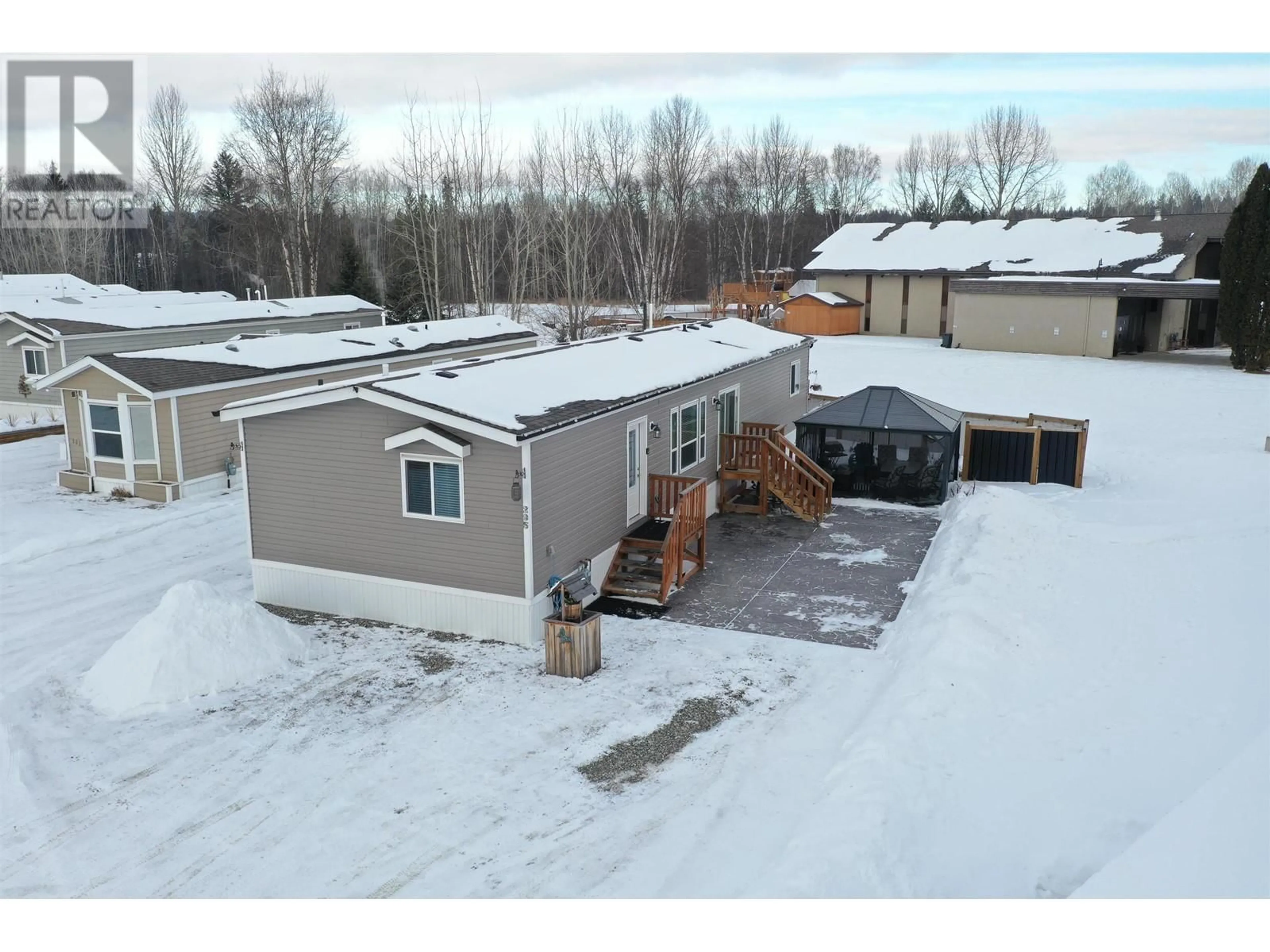 A pic from outside/outdoor area/front of a property/back of a property/a pic from drone, street for 295 KEROUAC ROAD, Quesnel British Columbia V2J7A2