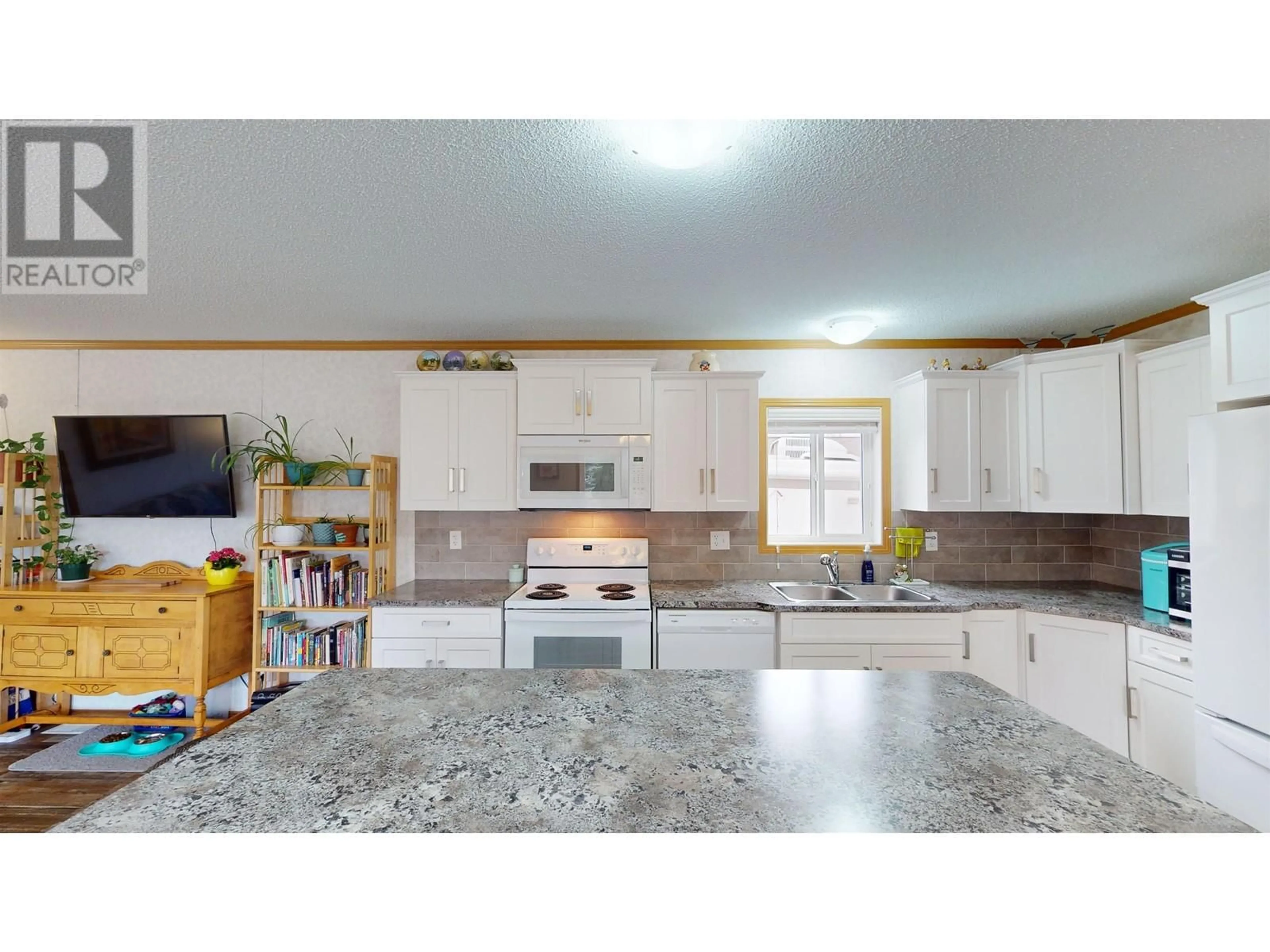 Open concept kitchen, ceramic/tile floor for 295 KEROUAC ROAD, Quesnel British Columbia V2J7A2