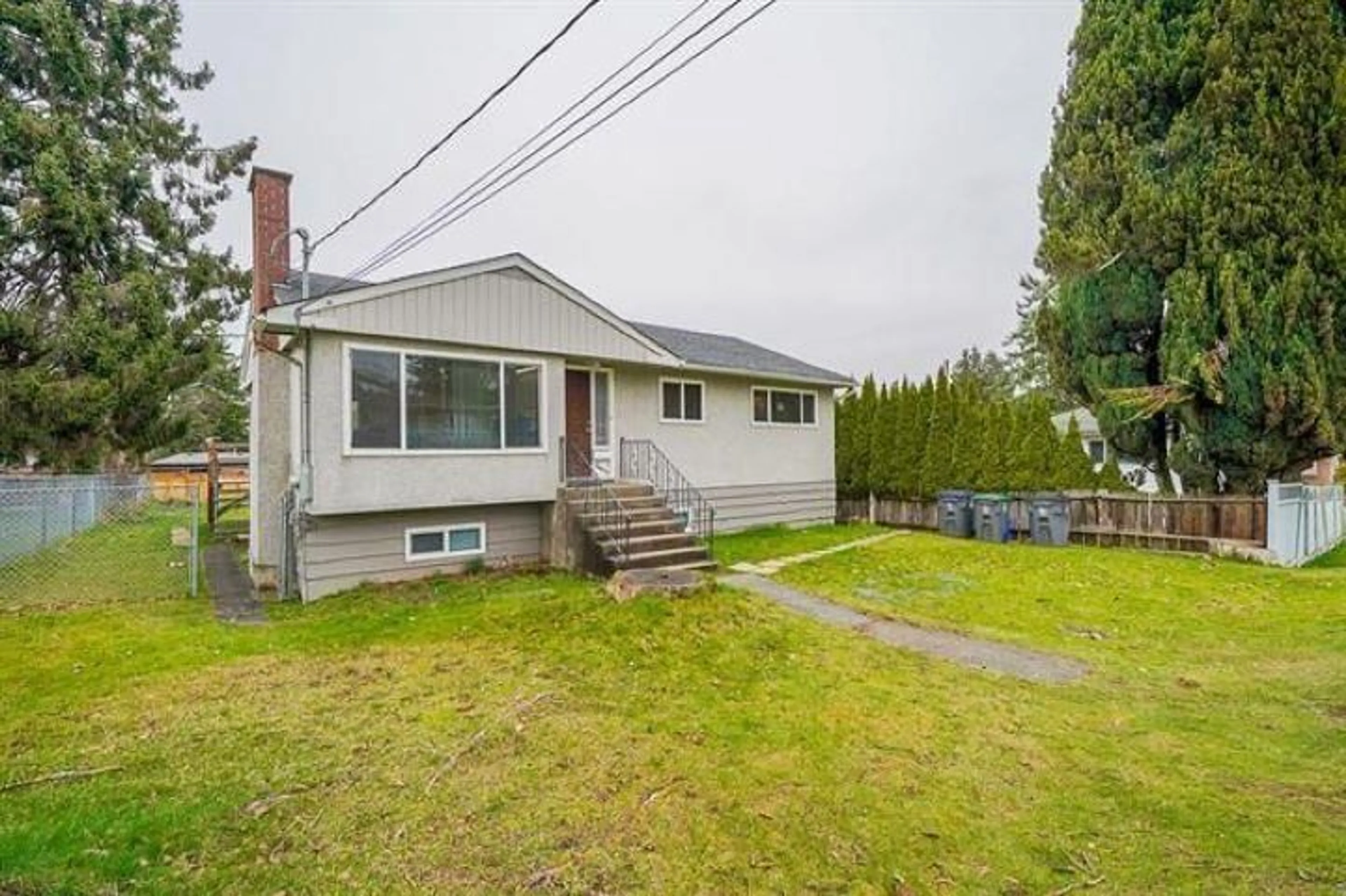A pic from outside/outdoor area/front of a property/back of a property/a pic from drone, street for 12679 97A, Surrey British Columbia V3V2H6