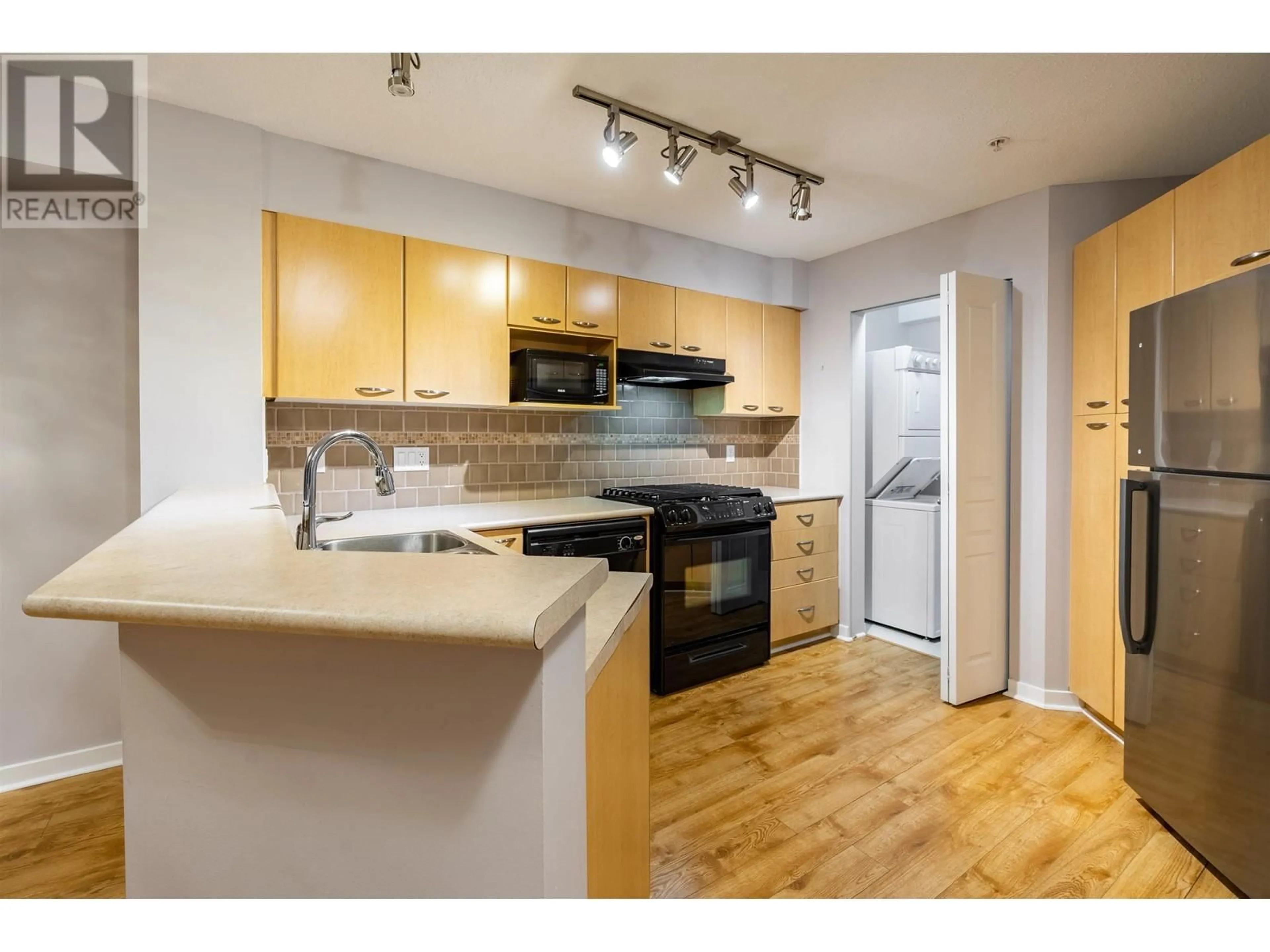 Standard kitchen, wood/laminate floor for 106 2958 SILVER SPRINGS BOULEVARD, Coquitlam British Columbia V3E3R9