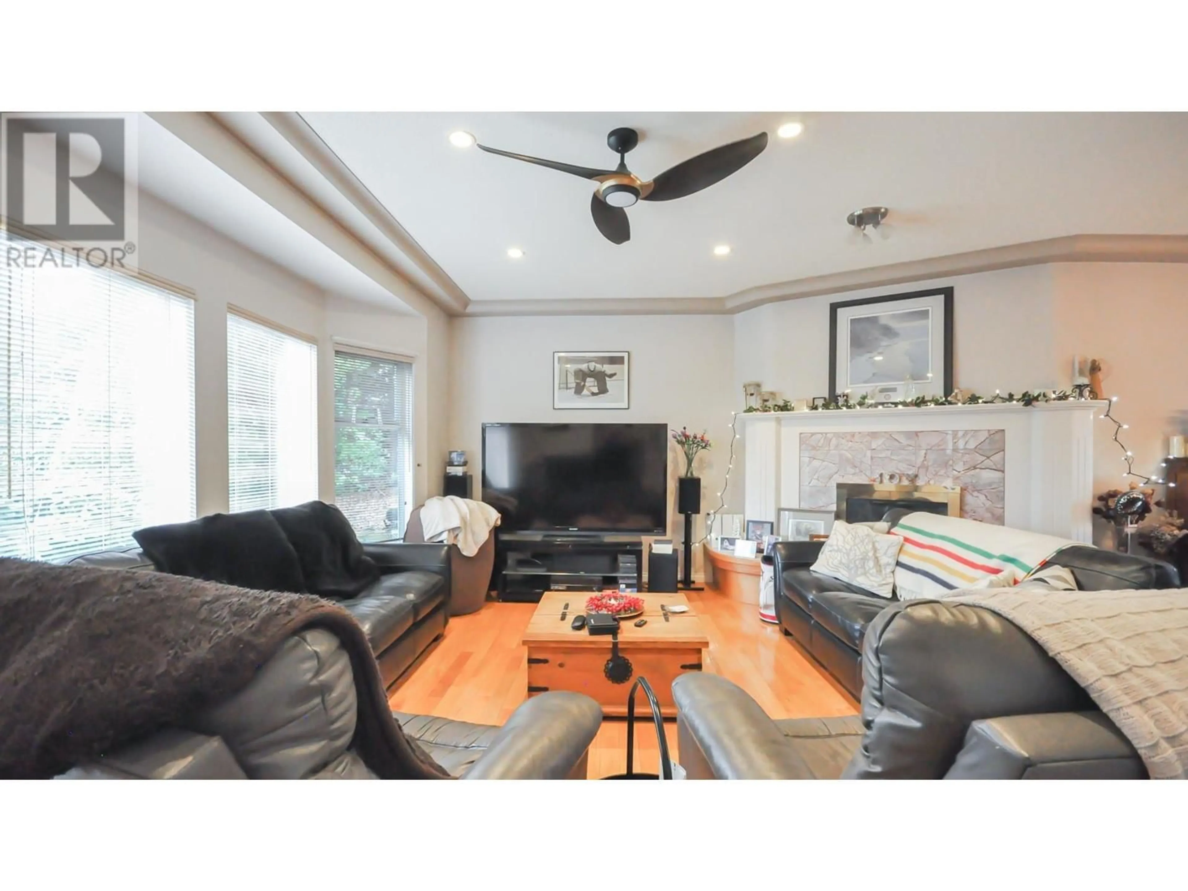 Living room with furniture, wood/laminate floor for 2215 SORRENTO DRIVE, Coquitlam British Columbia V3K6H6