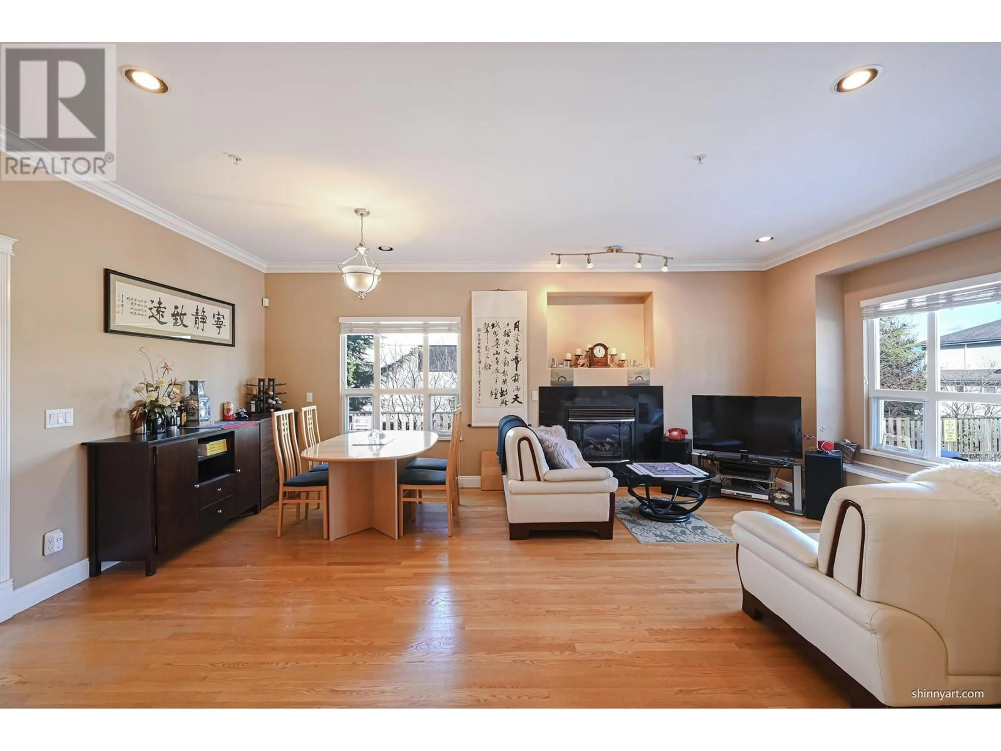 Living room with furniture, wood/laminate floor for 3506 HAIDA DRIVE, Vancouver British Columbia V5M3Z4