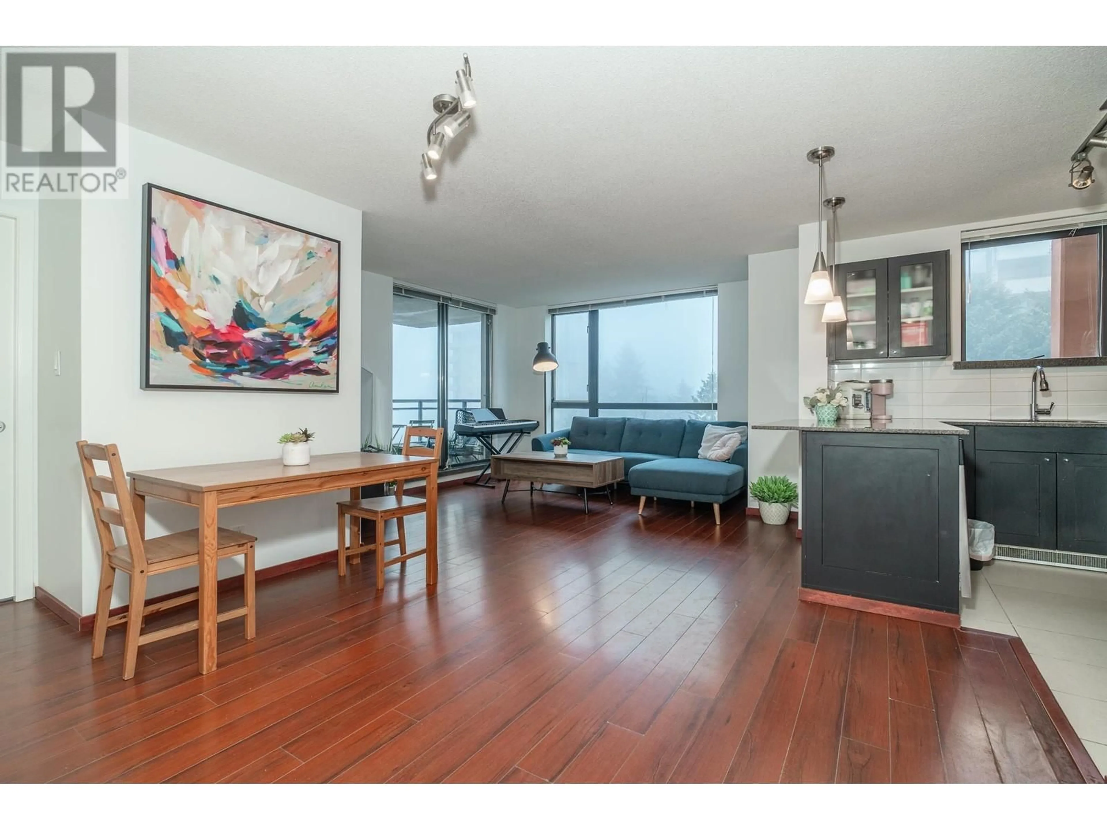 Living room with furniture, wood/laminate floor for 605 7225 ACORN AVENUE, Burnaby British Columbia V5E0A9