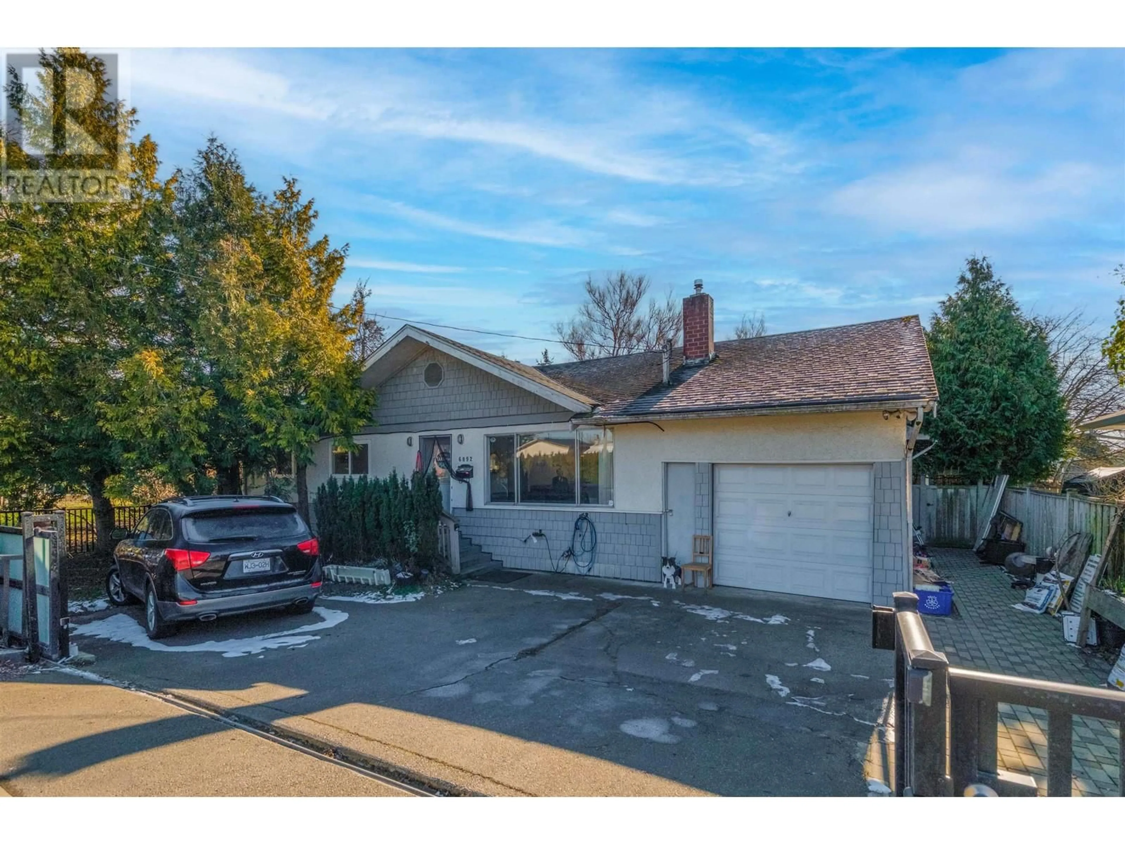 A pic from outside/outdoor area/front of a property/back of a property/a pic from drone, street for 6092 LADNER TRUNK ROAD, Delta British Columbia V4K1X8