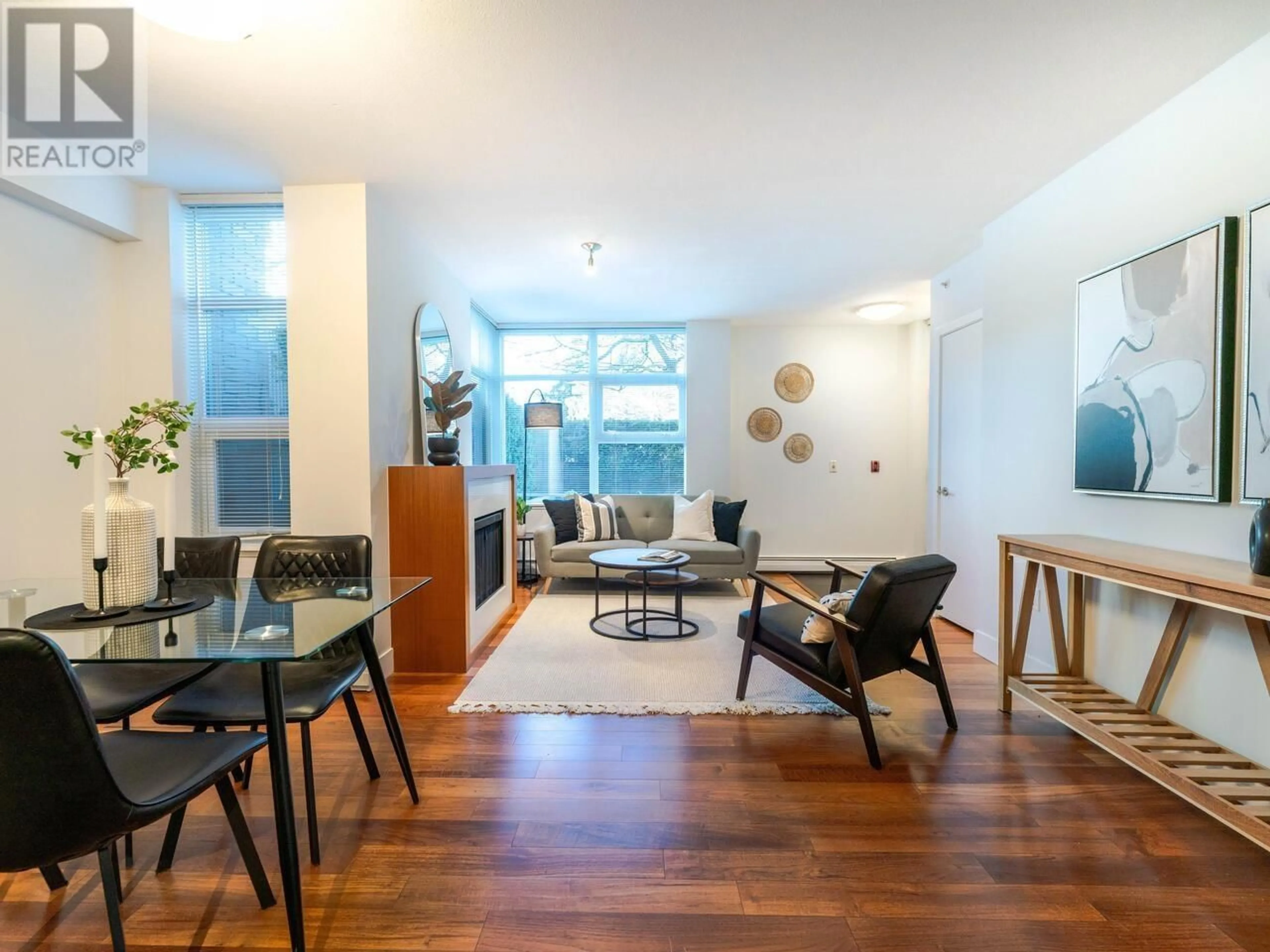 Living room with furniture, wood/laminate floor for 1303 CIVIC PLACE MEWS, North Vancouver British Columbia V7M0B2