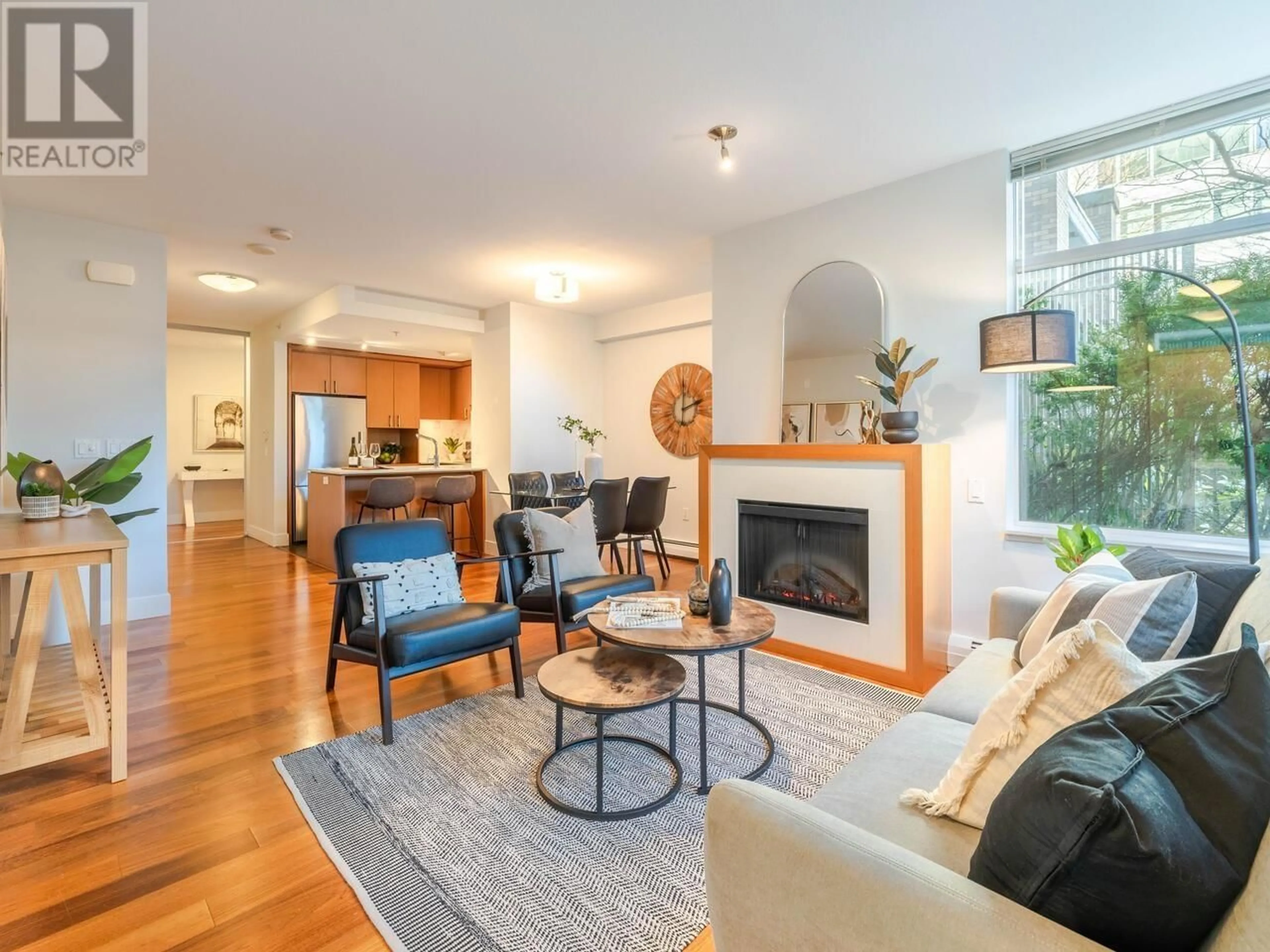 Living room with furniture, wood/laminate floor for 1303 CIVIC PLACE MEWS, North Vancouver British Columbia V7M0B2