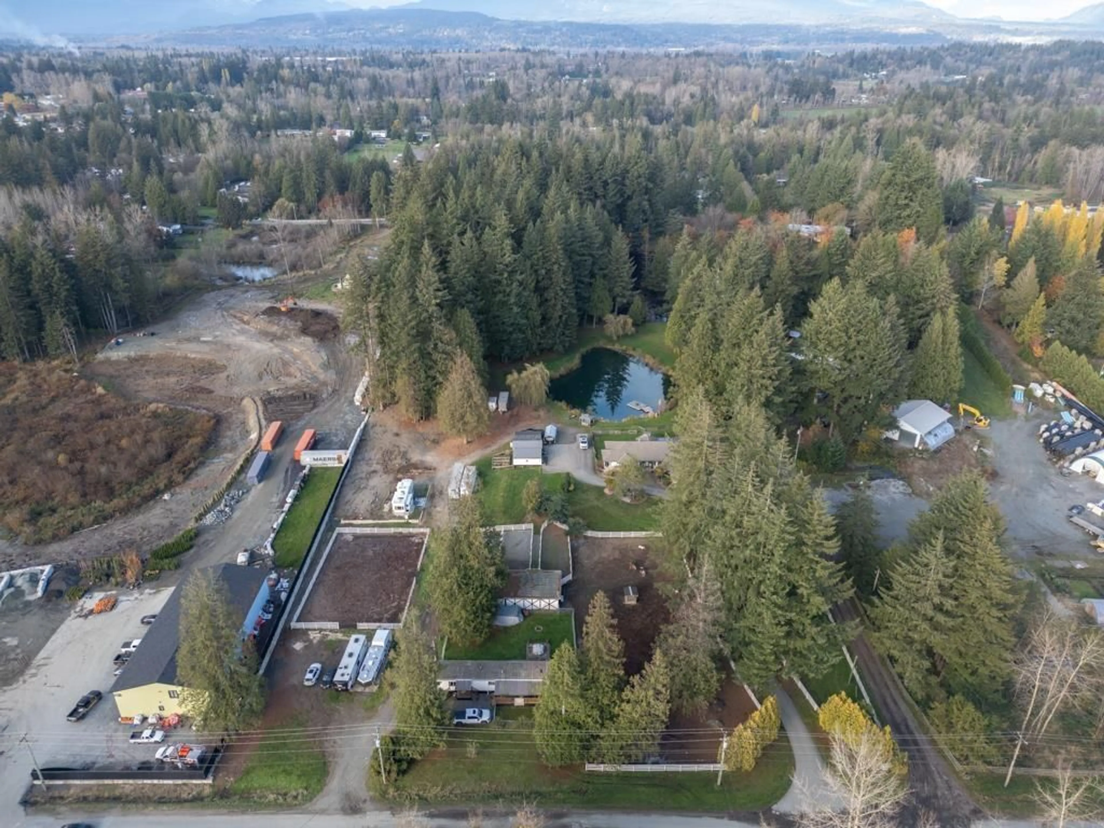 A pic from outside/outdoor area/front of a property/back of a property/a pic from drone, forest/trees view for 26643 58 AVENUE, Langley British Columbia V4W1V6