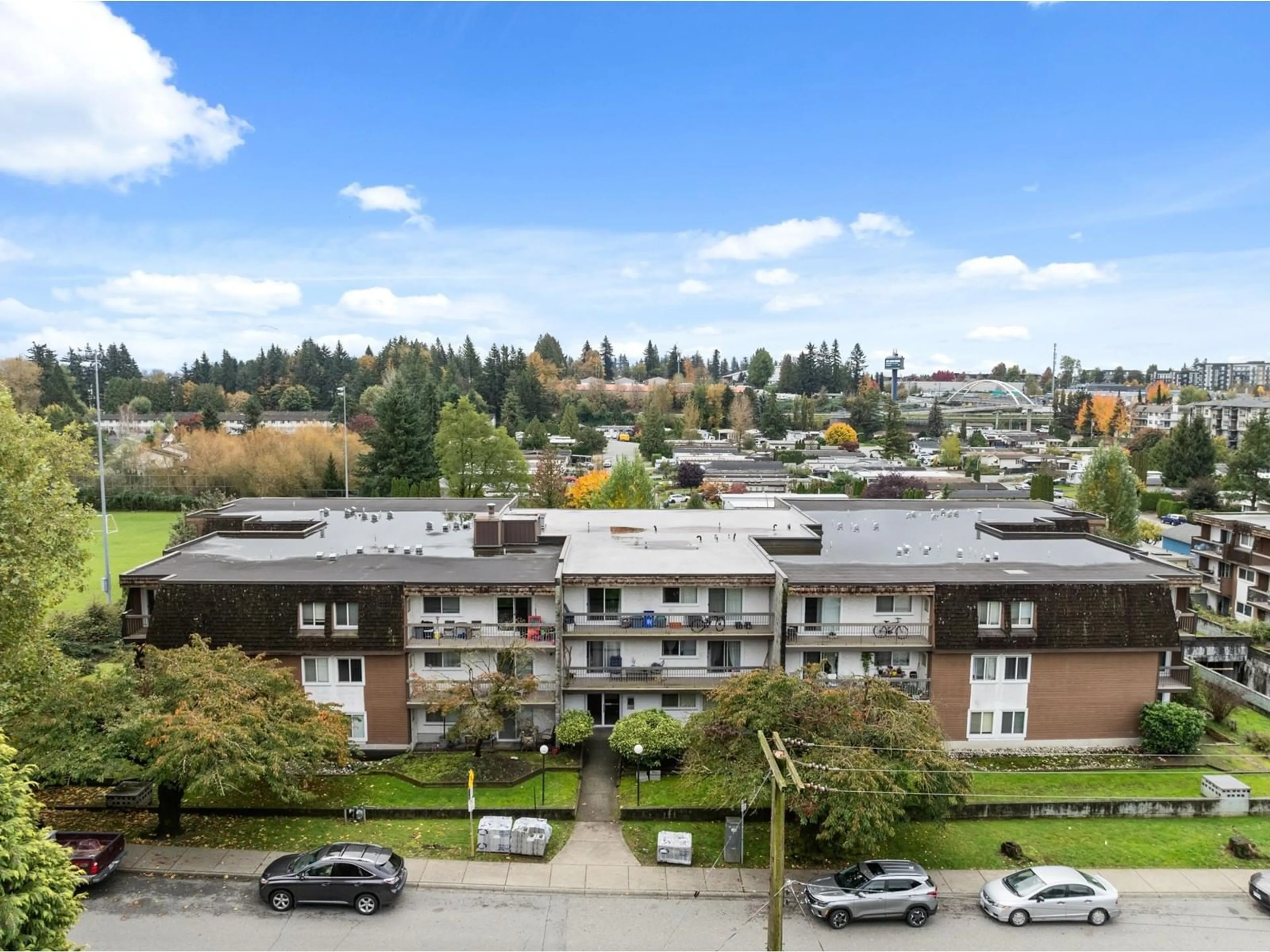 A pic from outside/outdoor area/front of a property/back of a property/a pic from drone, city buildings view from balcony for 110 33870 FERN STREET, Abbotsford British Columbia V2S6C3