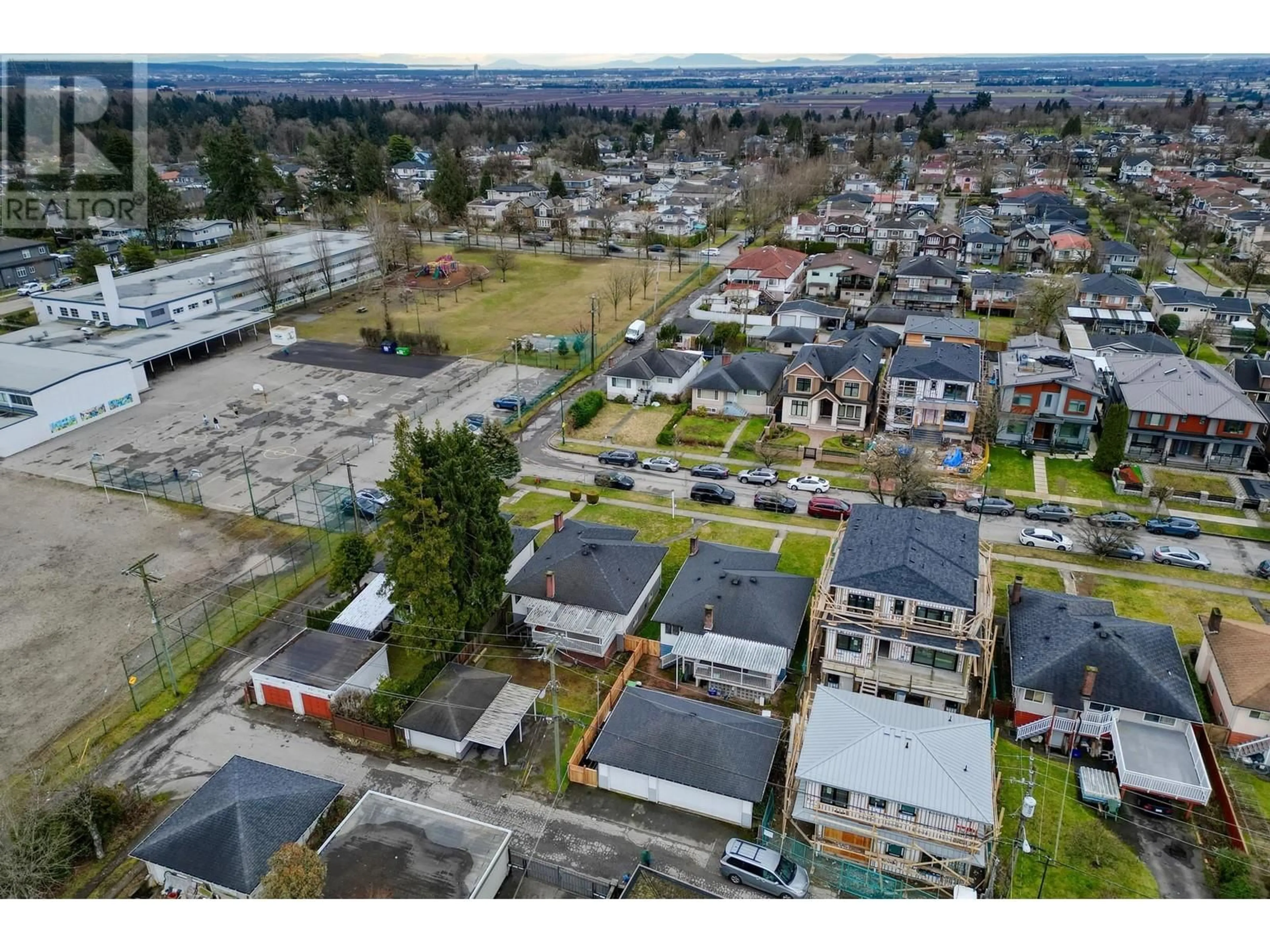 A pic from outside/outdoor area/front of a property/back of a property/a pic from drone, street for 2477 E 53RD AVENUE, Vancouver British Columbia V5S1V7