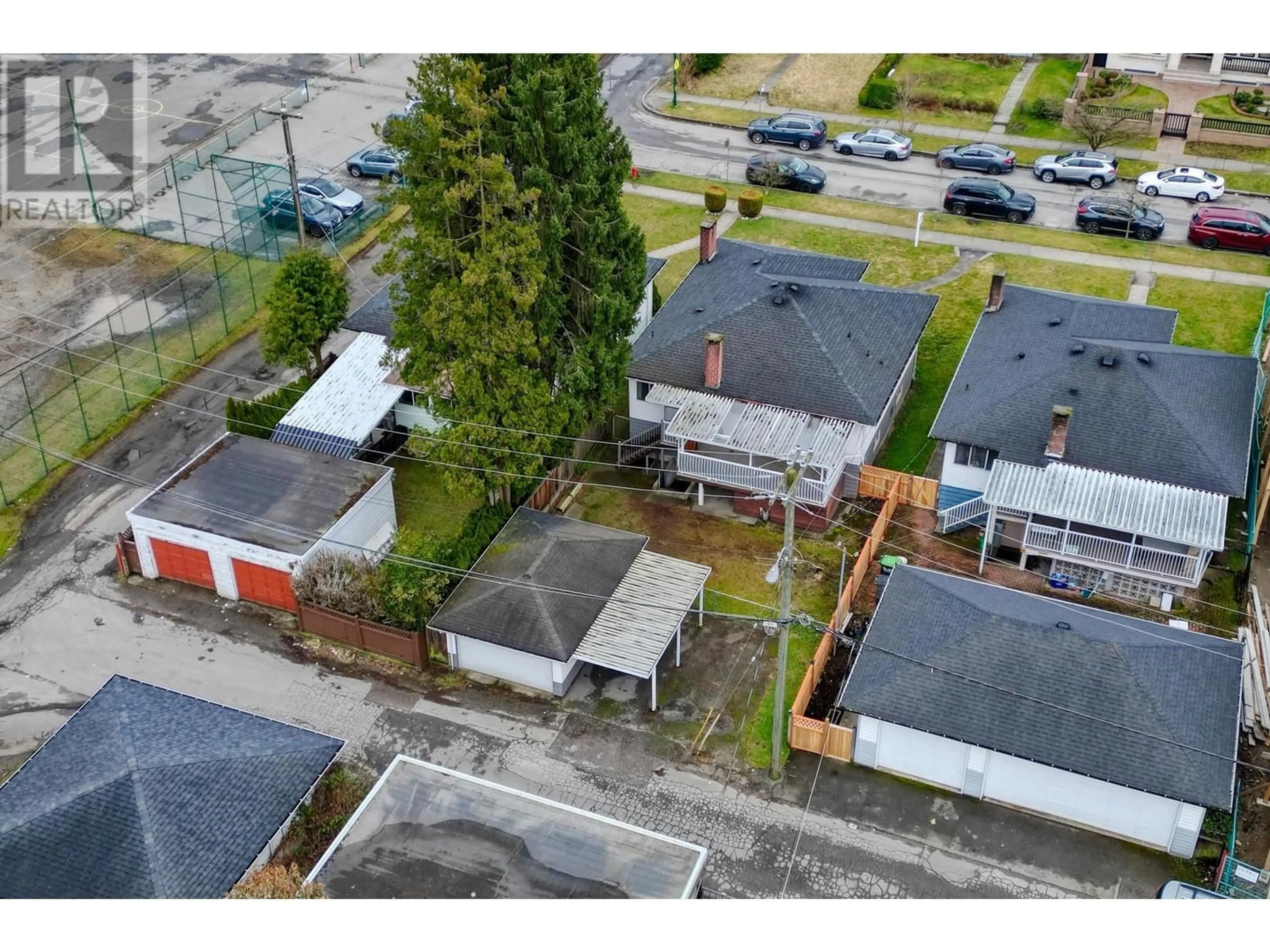 A pic from outside/outdoor area/front of a property/back of a property/a pic from drone, street for 2477 E 53RD AVENUE, Vancouver British Columbia V5S1V7