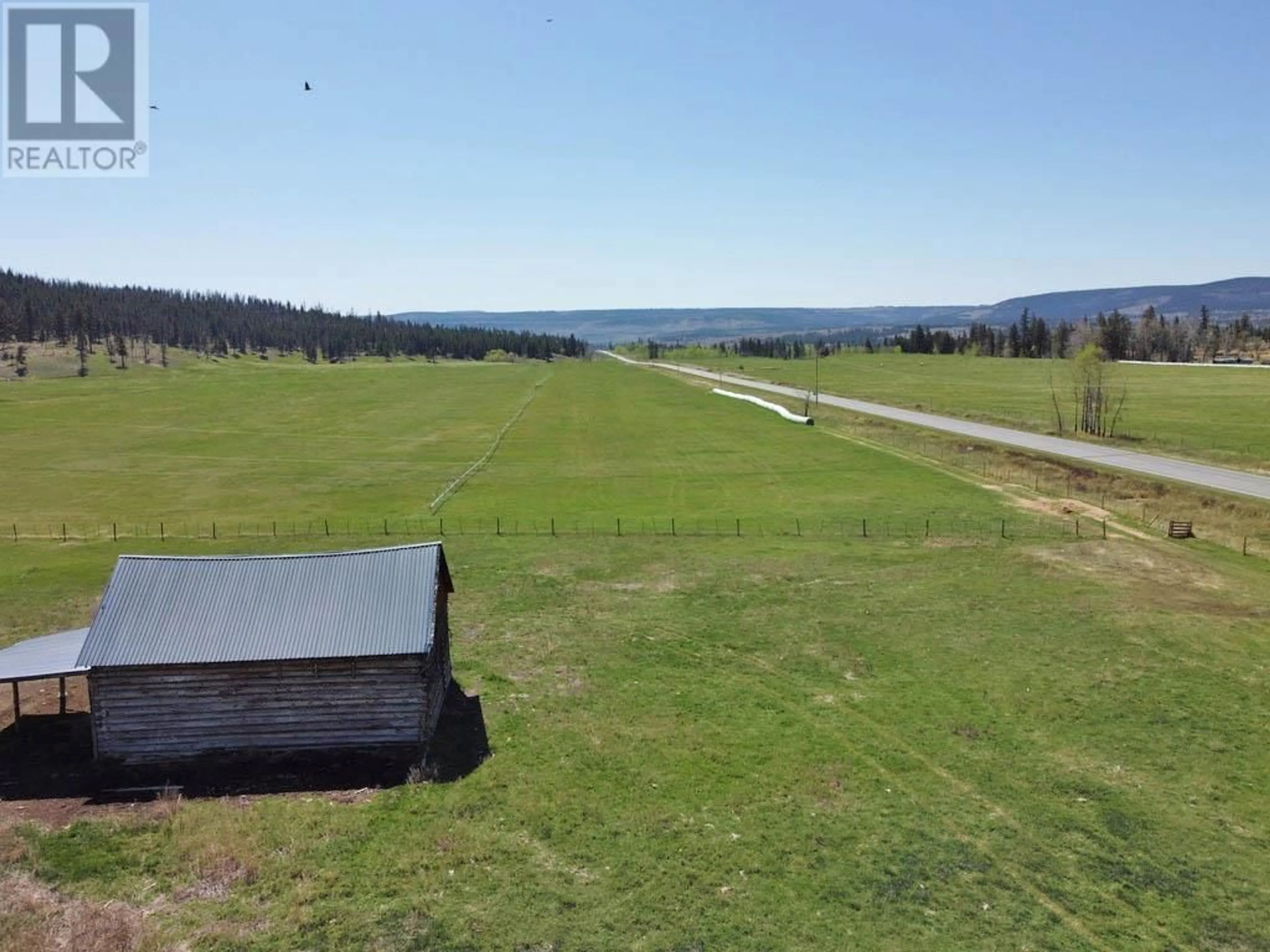 A pic from outside/outdoor area/front of a property/back of a property/a pic from drone, water/lake/river/ocean view for 6547 20 HIGHWAY, Chilcotin British Columbia V0L1K0
