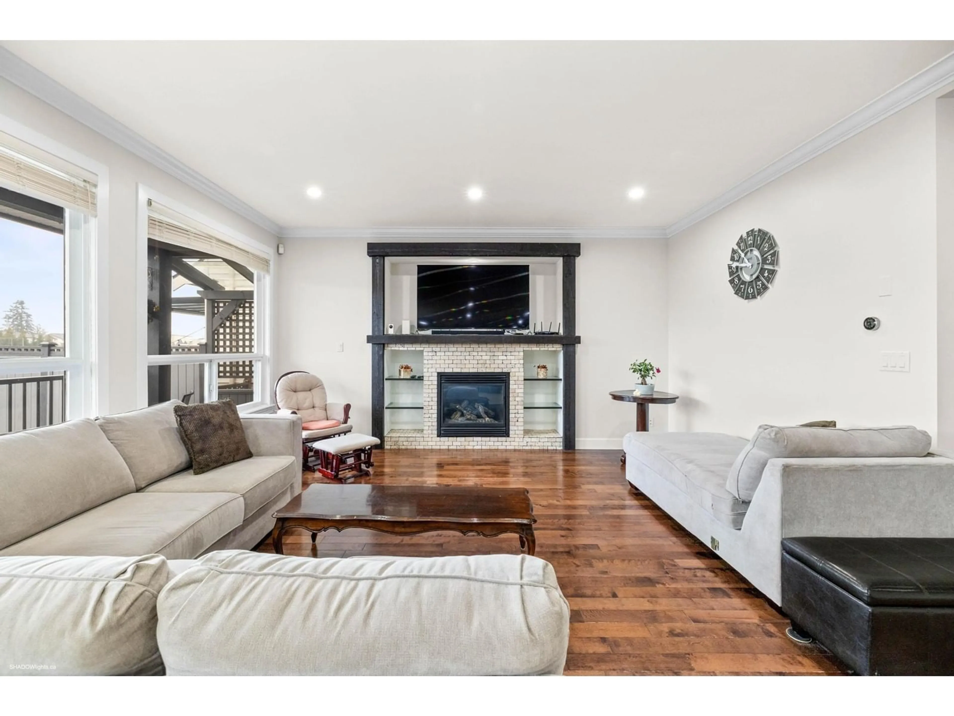 Living room with furniture, wood/laminate floor for 8151 211 STREET, Langley British Columbia V2Y0E4