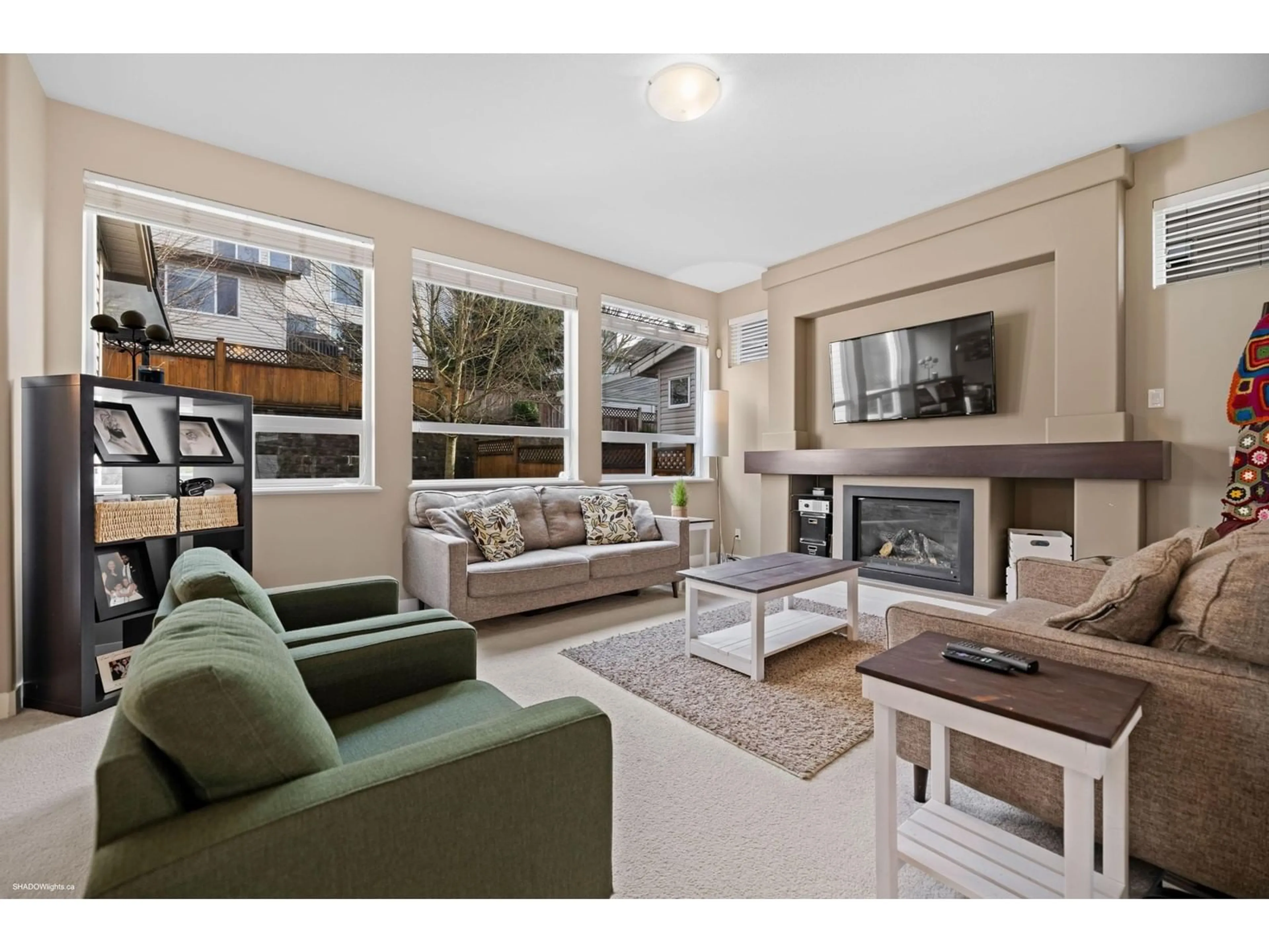 Living room with furniture, wood/laminate floor for 7016 178TH ST STREET, Surrey British Columbia V3S8S2