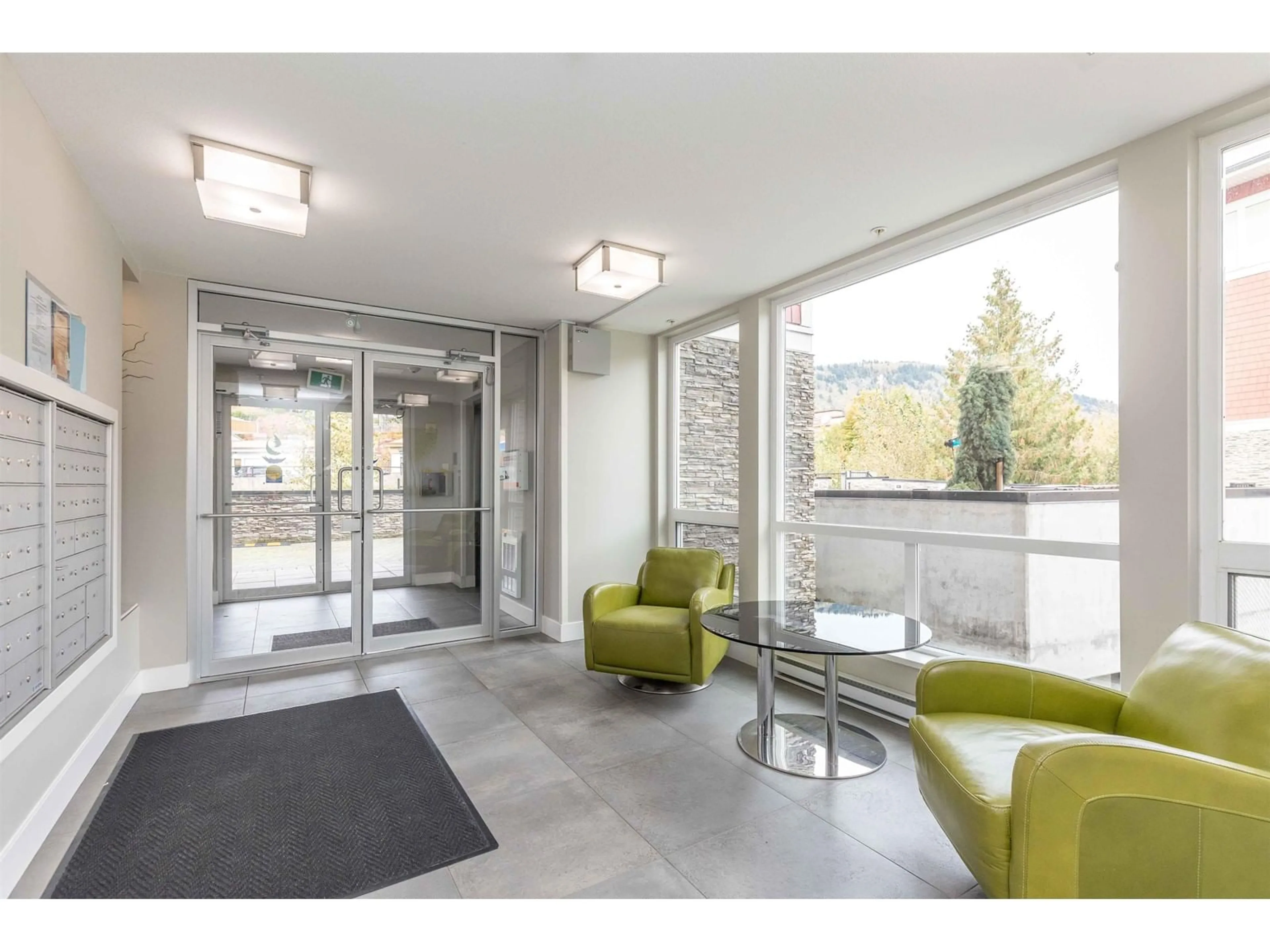 Indoor foyer for 201 2242 WHATCOM ROAD, Abbotsford British Columbia V3G0G3