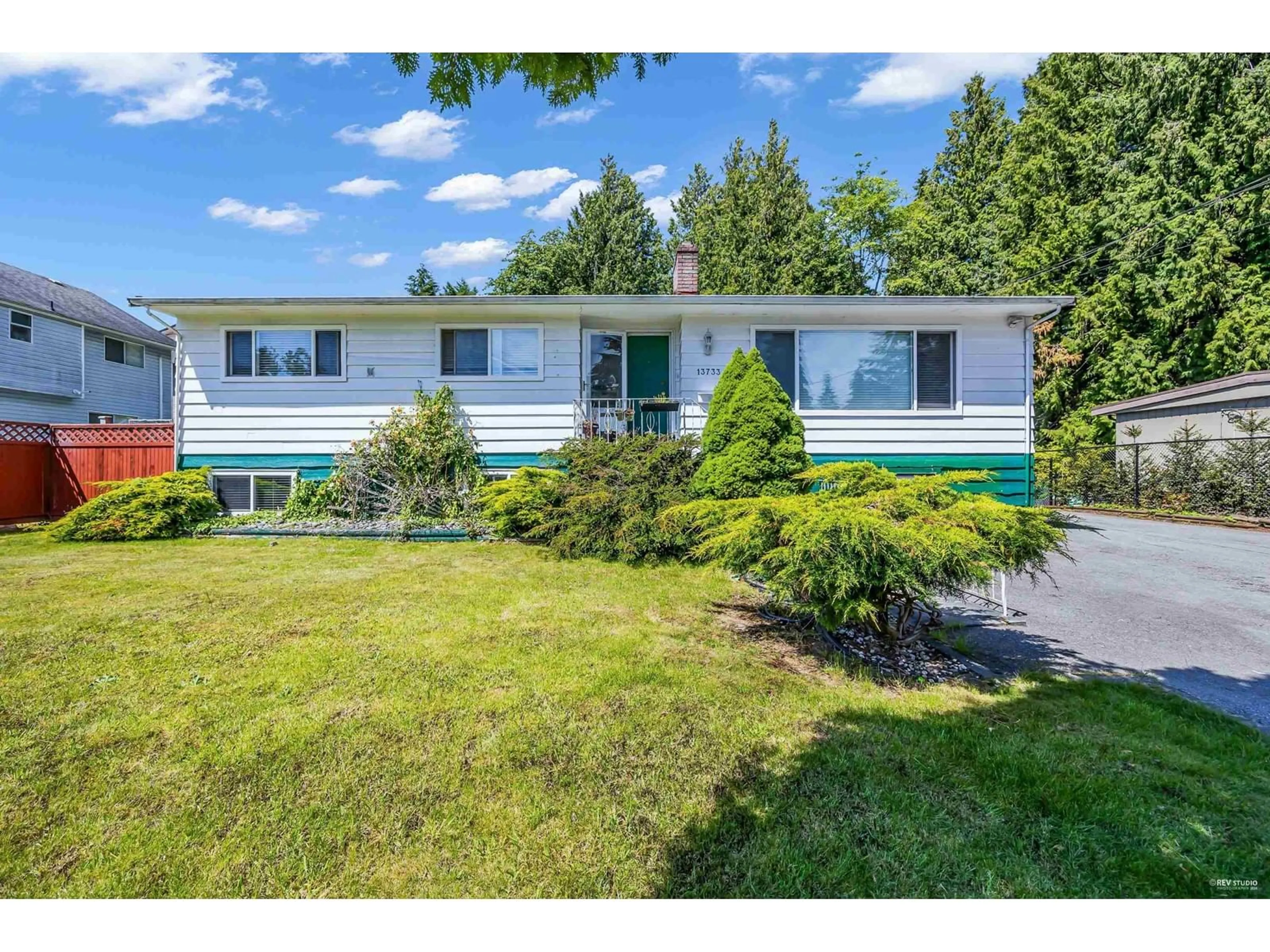Home with vinyl exterior material, street for 13733 67A, Surrey British Columbia V3W2C2