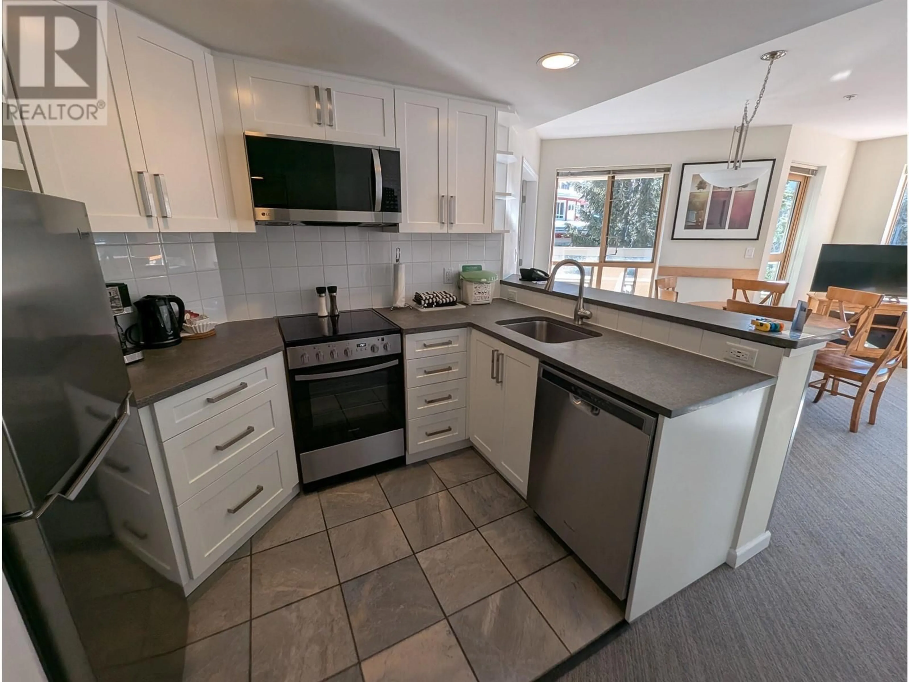 Open concept kitchen, ceramic/tile floor for 219 4338 MAIN STREET, Whistler British Columbia V8E1B4