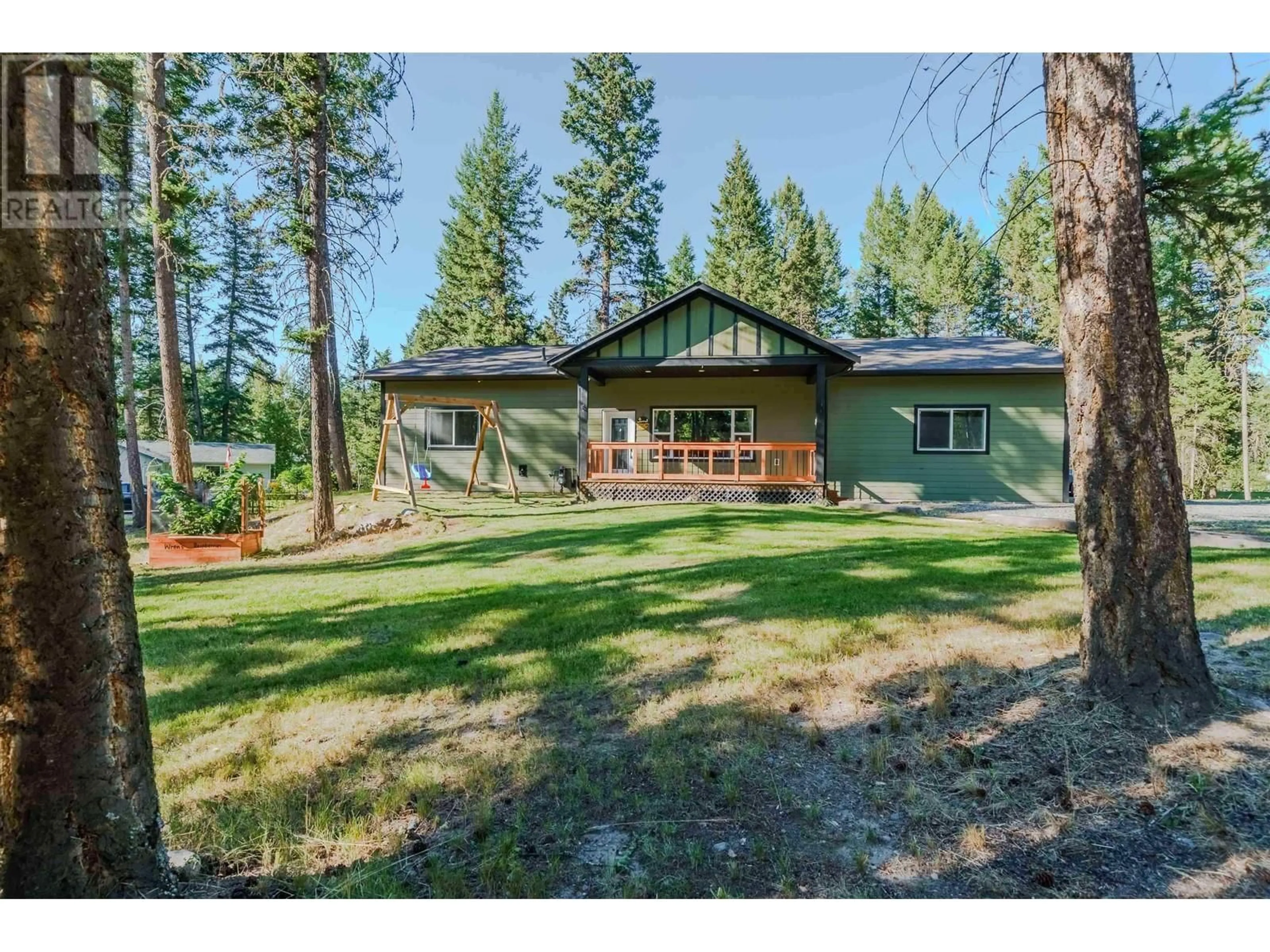 A pic from outside/outdoor area/front of a property/back of a property/a pic from drone, forest/trees view for 5065 KINNCUM ROAD, 108 Mile Ranch British Columbia V0K2Z0