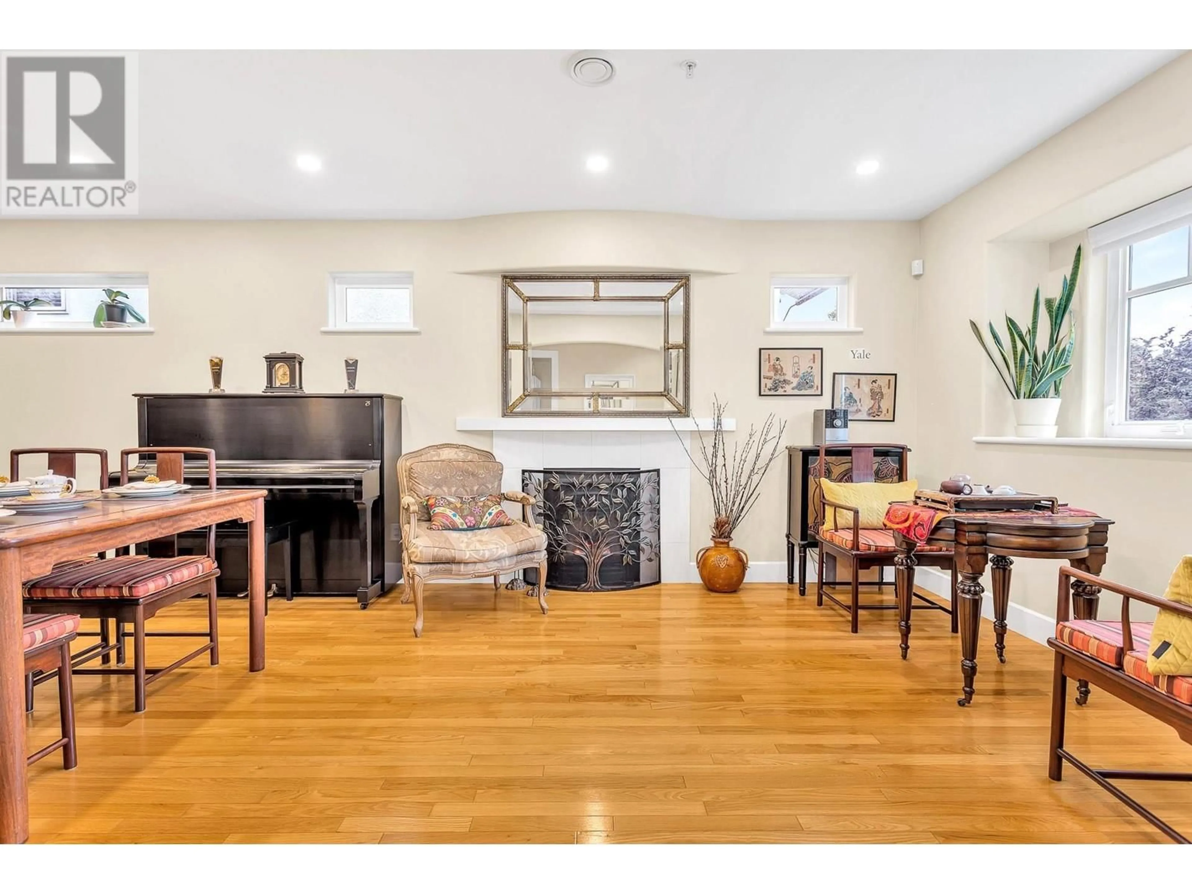 Living room with furniture, wood/laminate floor for 7408 LABURNUM STREET, Vancouver British Columbia V6P5N3