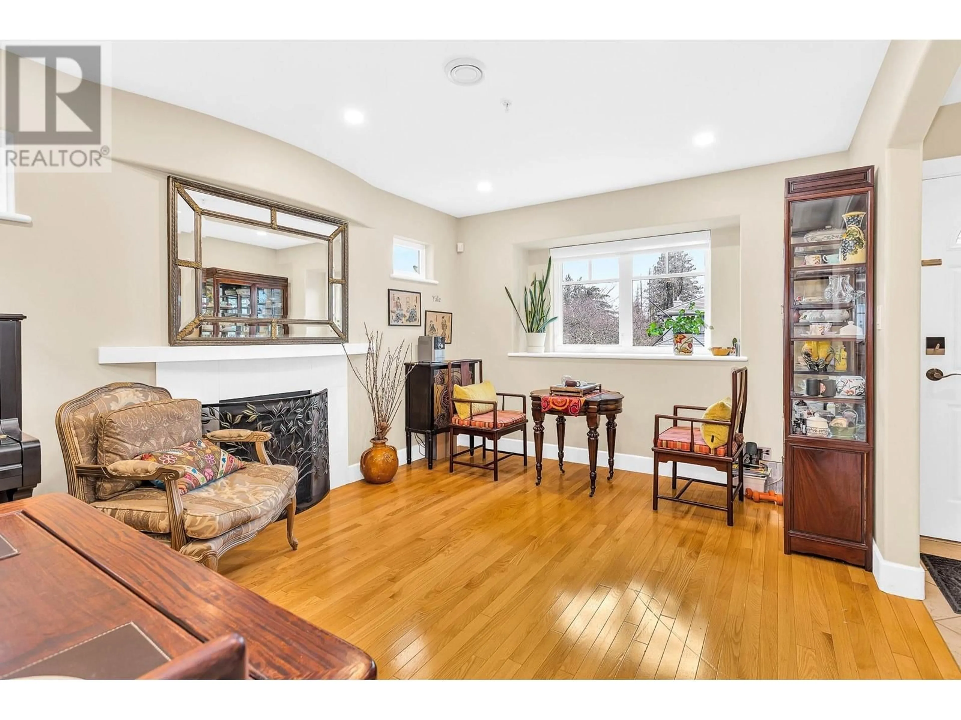 Living room with furniture, wood/laminate floor for 7408 LABURNUM STREET, Vancouver British Columbia V6P5N3