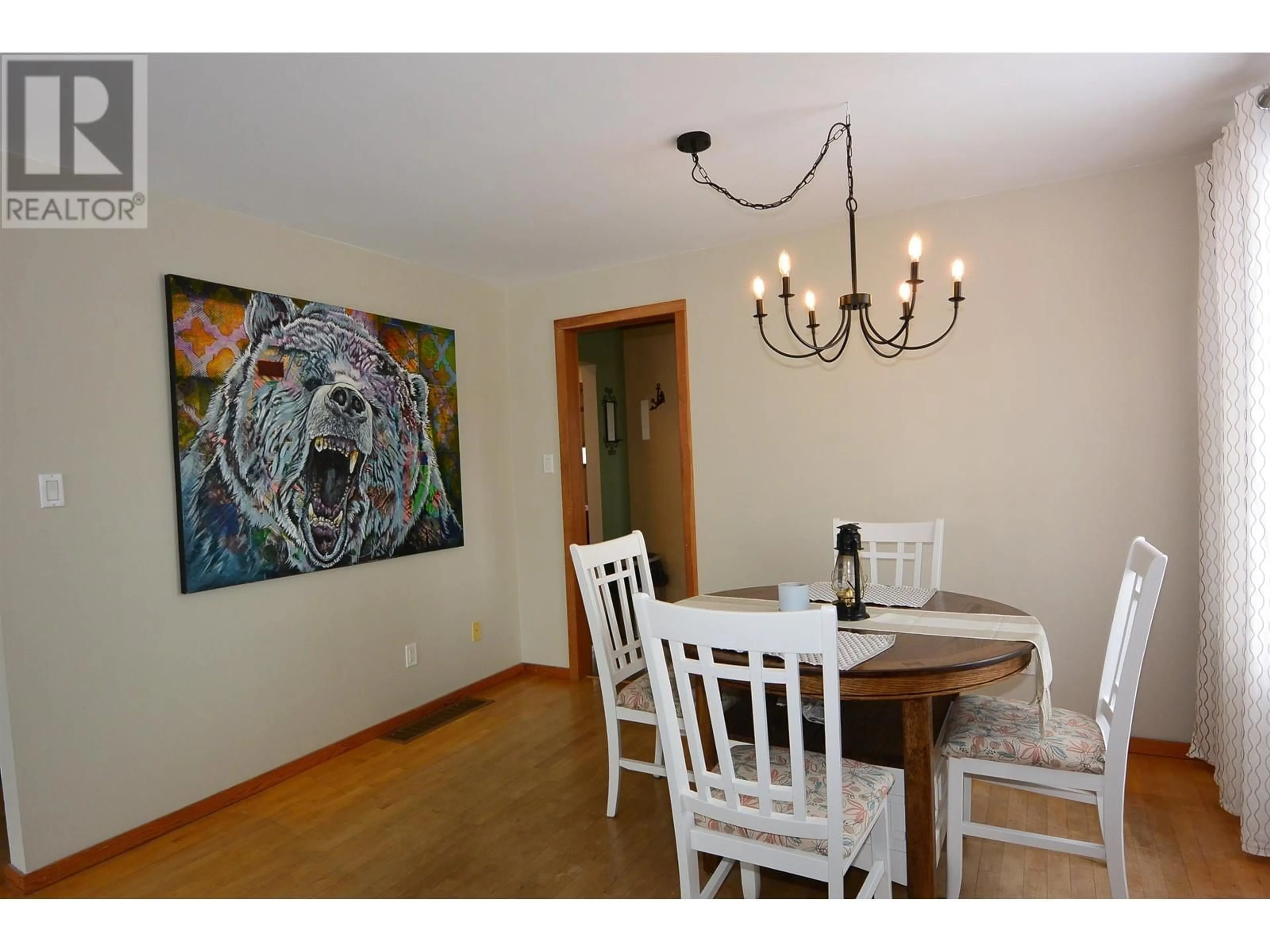 Dining room, wood/laminate floor for 3773 14TH AVENUE, Smithers British Columbia V0J2N0