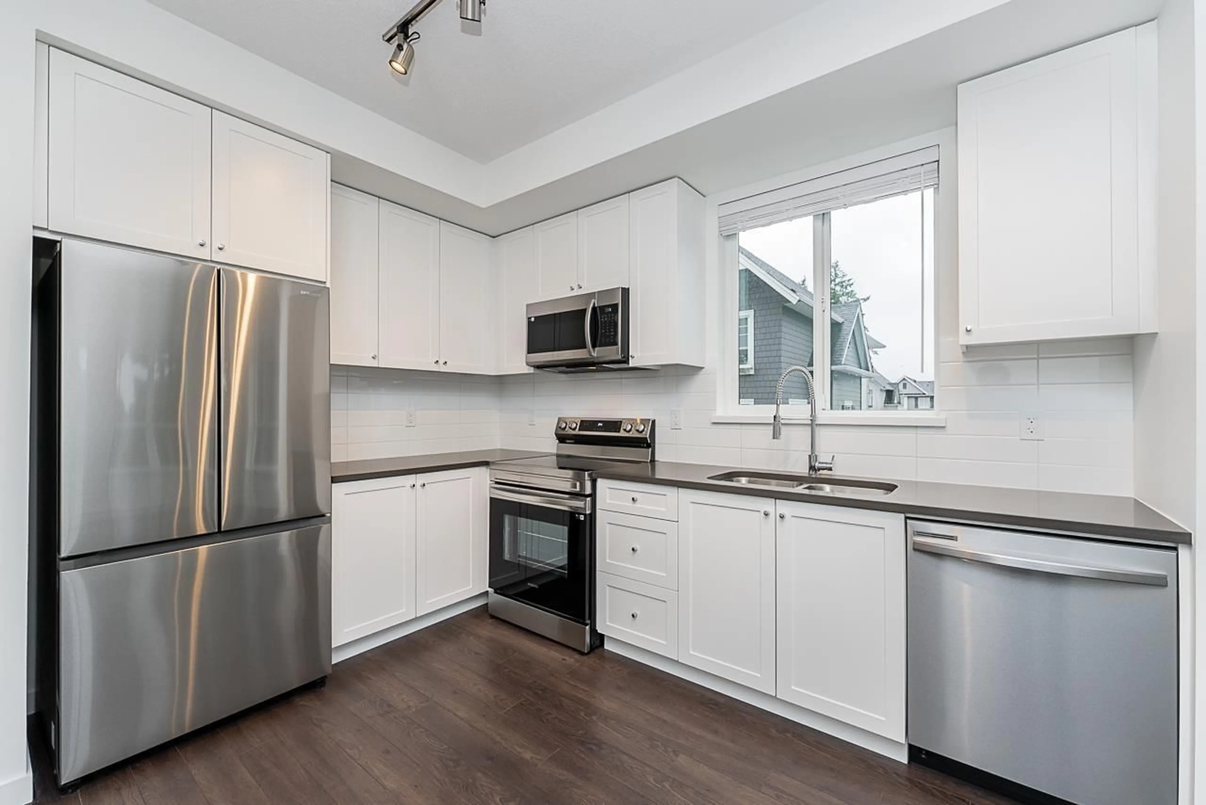 Standard kitchen, wood/laminate floor for 214 15738 85 AVENUE, Surrey British Columbia V4N6Y1