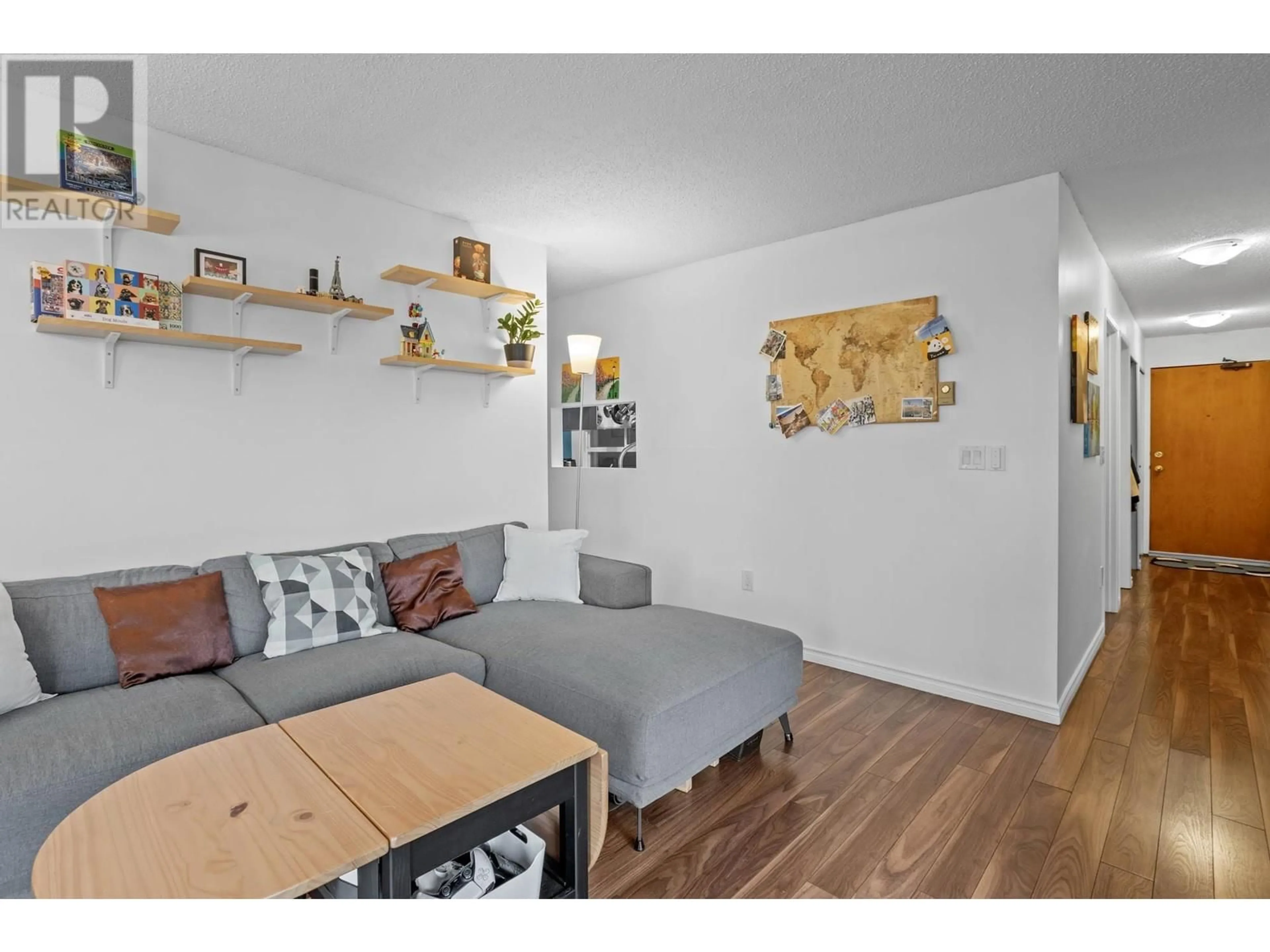 Living room with furniture, wood/laminate floor for 311 1345 W 4TH AVENUE, Vancouver British Columbia V6H3Y8