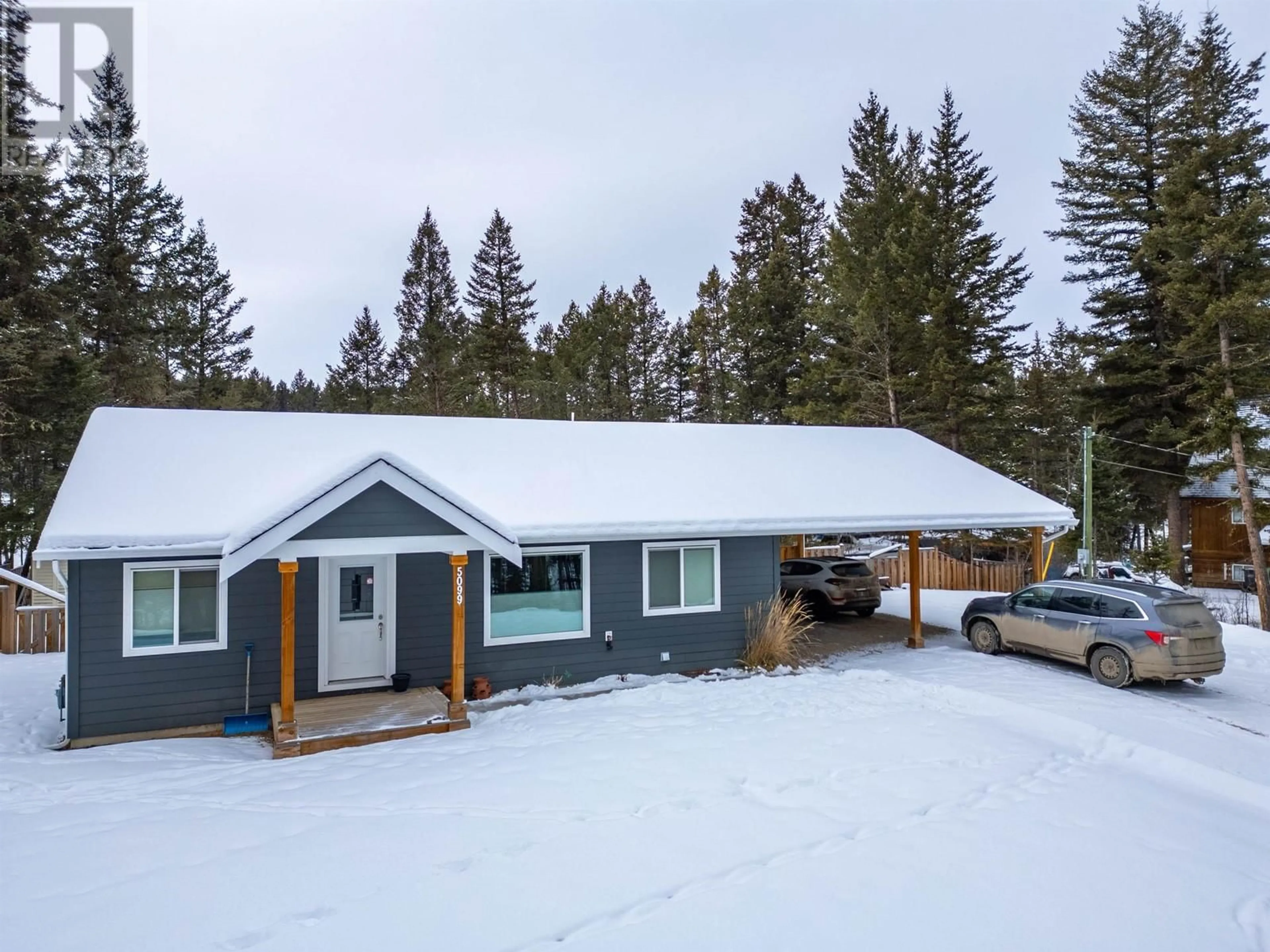 A pic from outside/outdoor area/front of a property/back of a property/a pic from drone, street for 5099 EASZEE DRIVE, 108 Mile Ranch British Columbia V0K2Z0