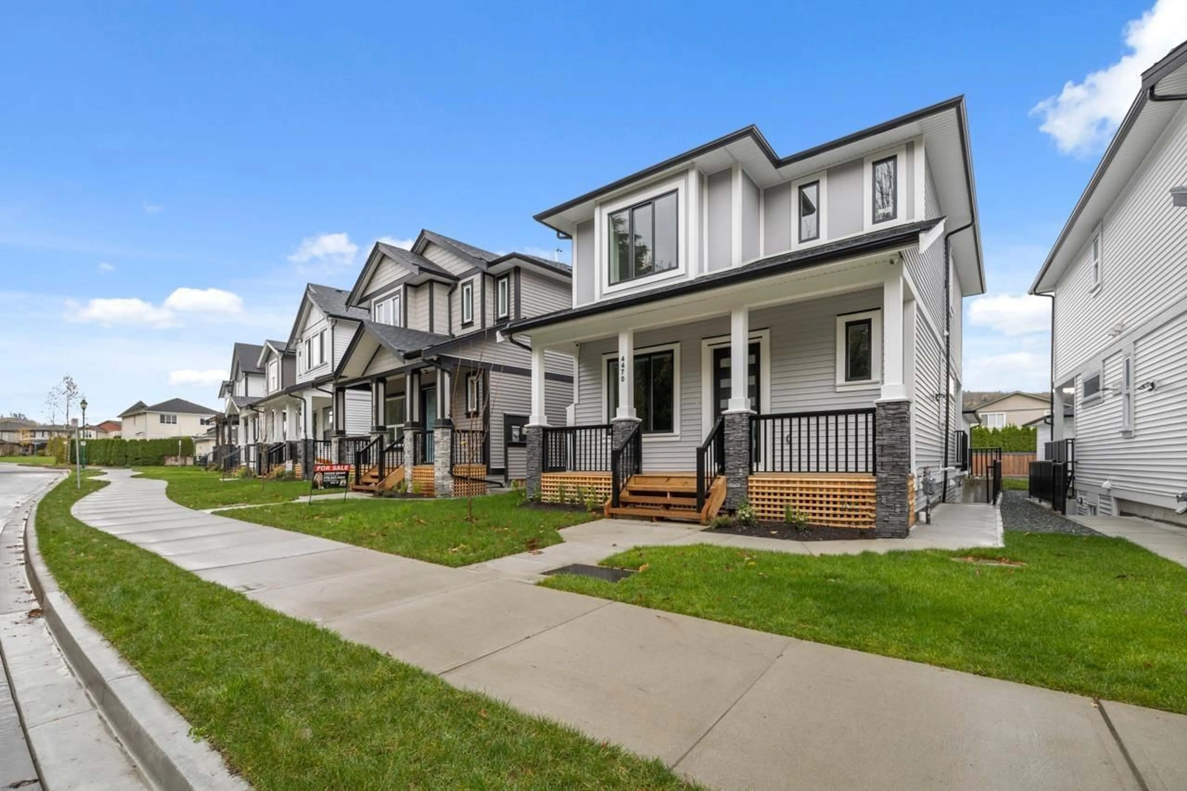 Home with vinyl exterior material, street for 4470 STEPHEN LEACOCK DRIVE, Abbotsford British Columbia V2T5B6