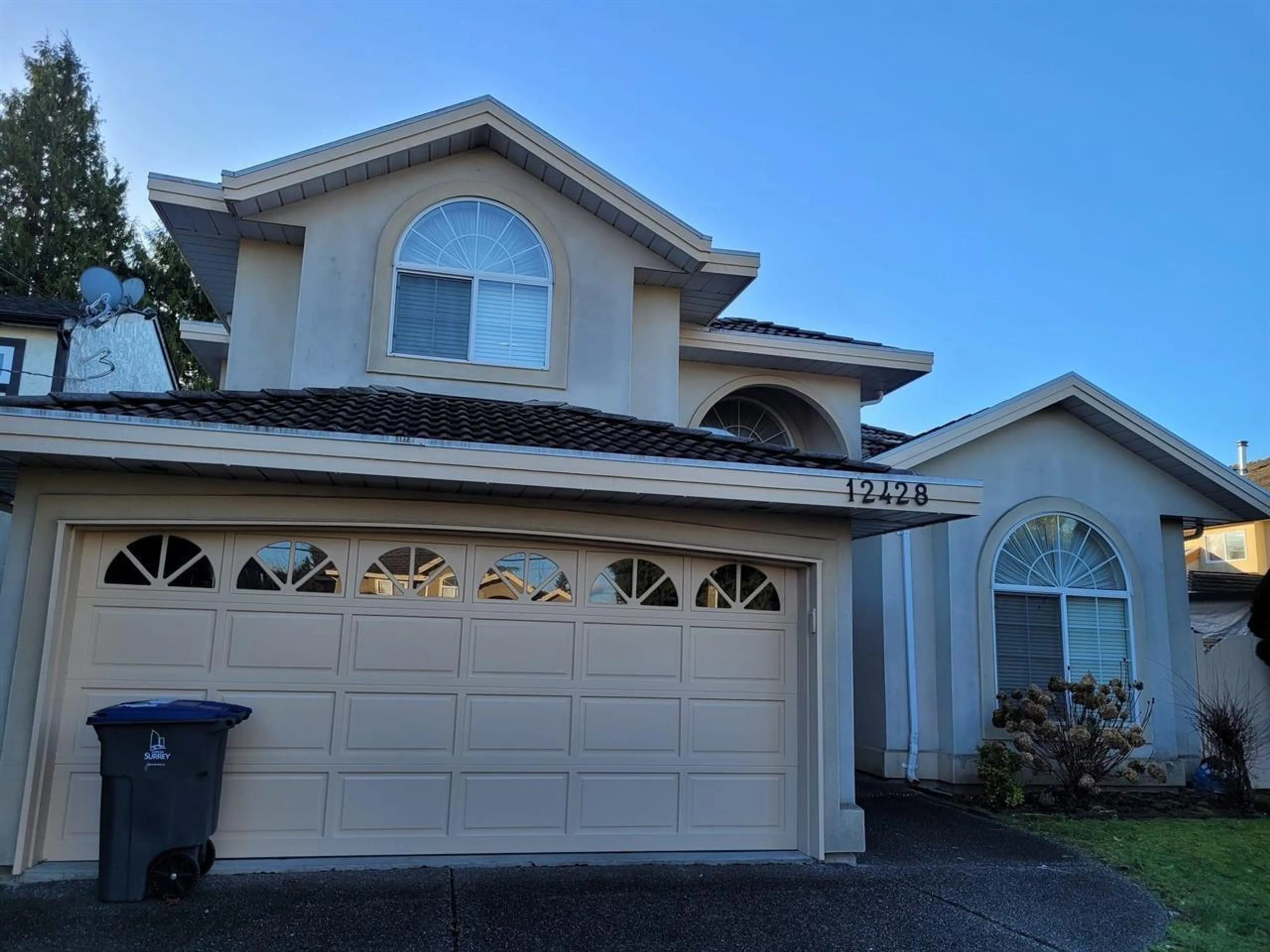 Home with vinyl exterior material, street for 12428 78 AVENUE, Surrey British Columbia V3W8K1