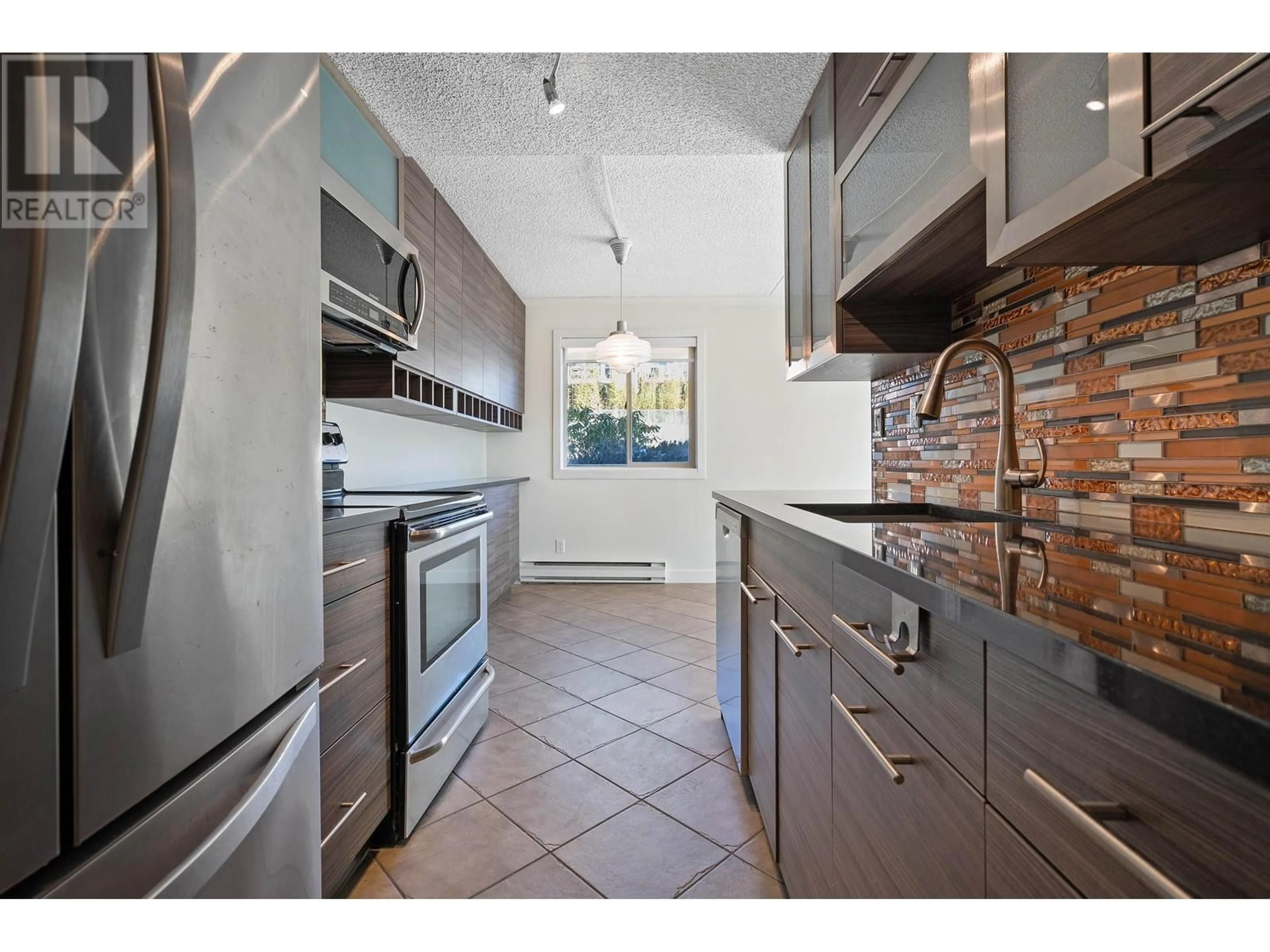 Standard kitchen, ceramic/tile floor for 201 110 W 4TH STREET, North Vancouver British Columbia V7M3H3