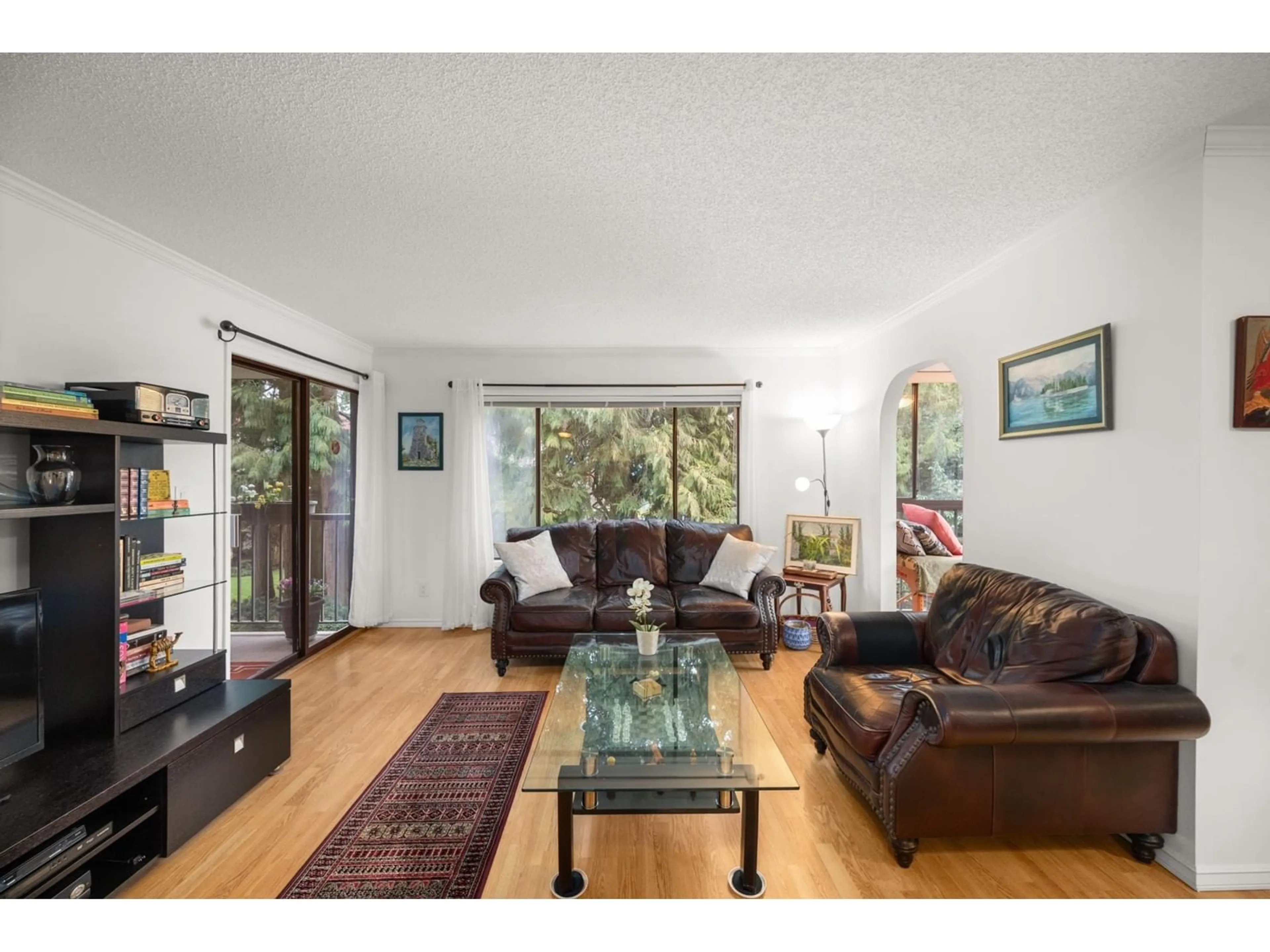 Living room with furniture, wood/laminate floor for 212 1520 VIDAL STREET, White Rock British Columbia V4B3T7