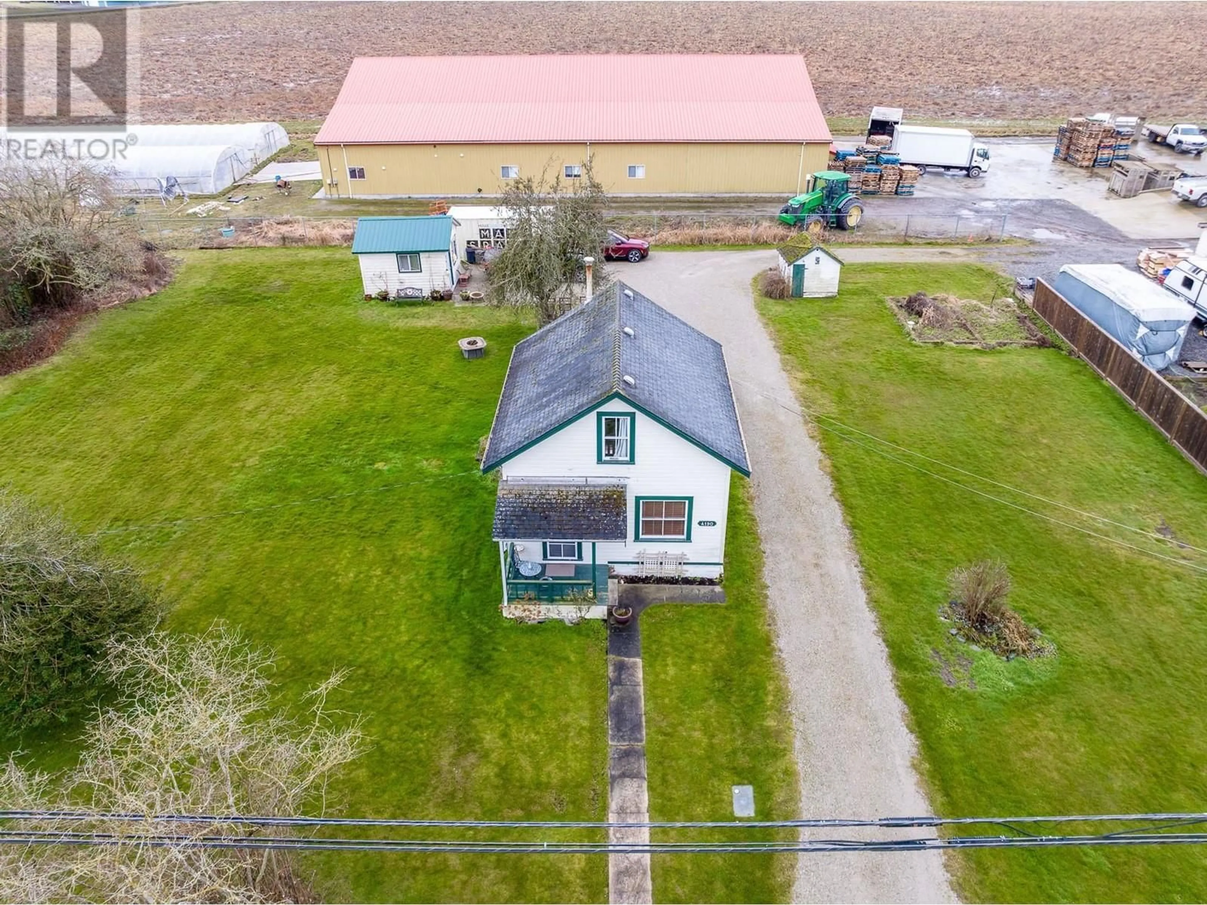 A pic from outside/outdoor area/front of a property/back of a property/a pic from drone, building for 4190 RIVER ROAD, Delta British Columbia V4K1S1