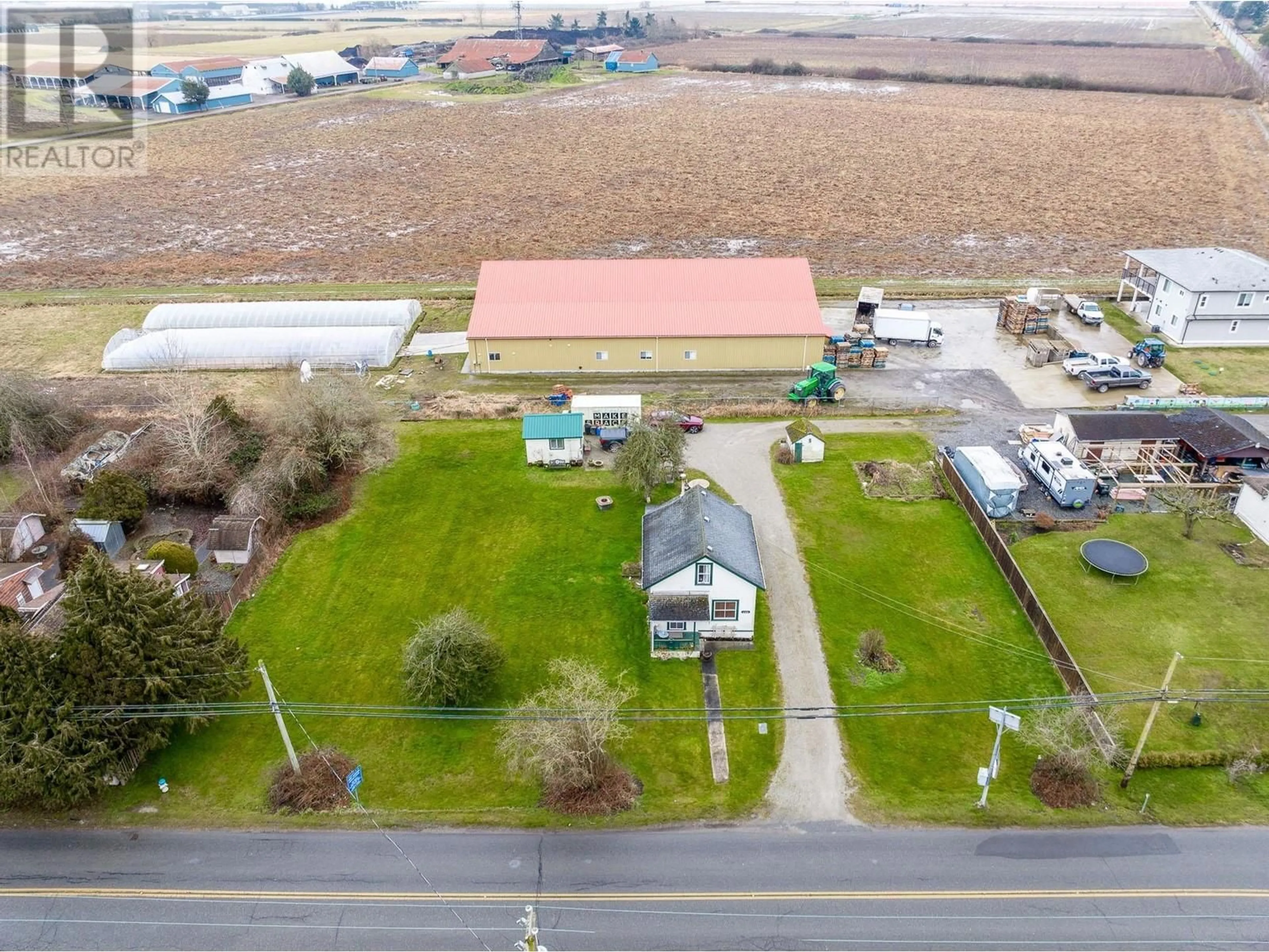 A pic from outside/outdoor area/front of a property/back of a property/a pic from drone, building for 4190 RIVER ROAD, Delta British Columbia V4K1S1