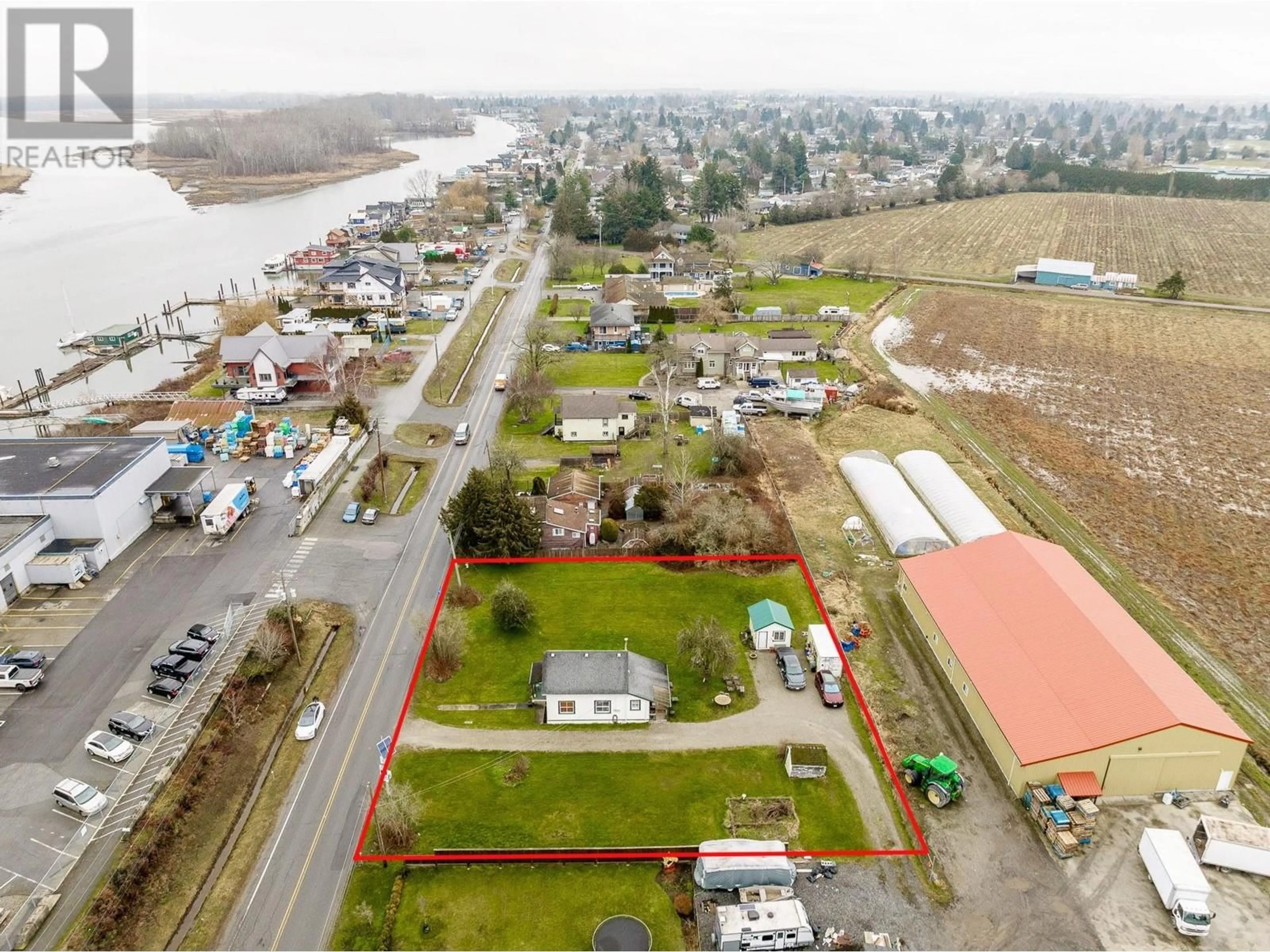 A pic from outside/outdoor area/front of a property/back of a property/a pic from drone, water/lake/river/ocean view for 4190 RIVER ROAD, Delta British Columbia V4K1S1