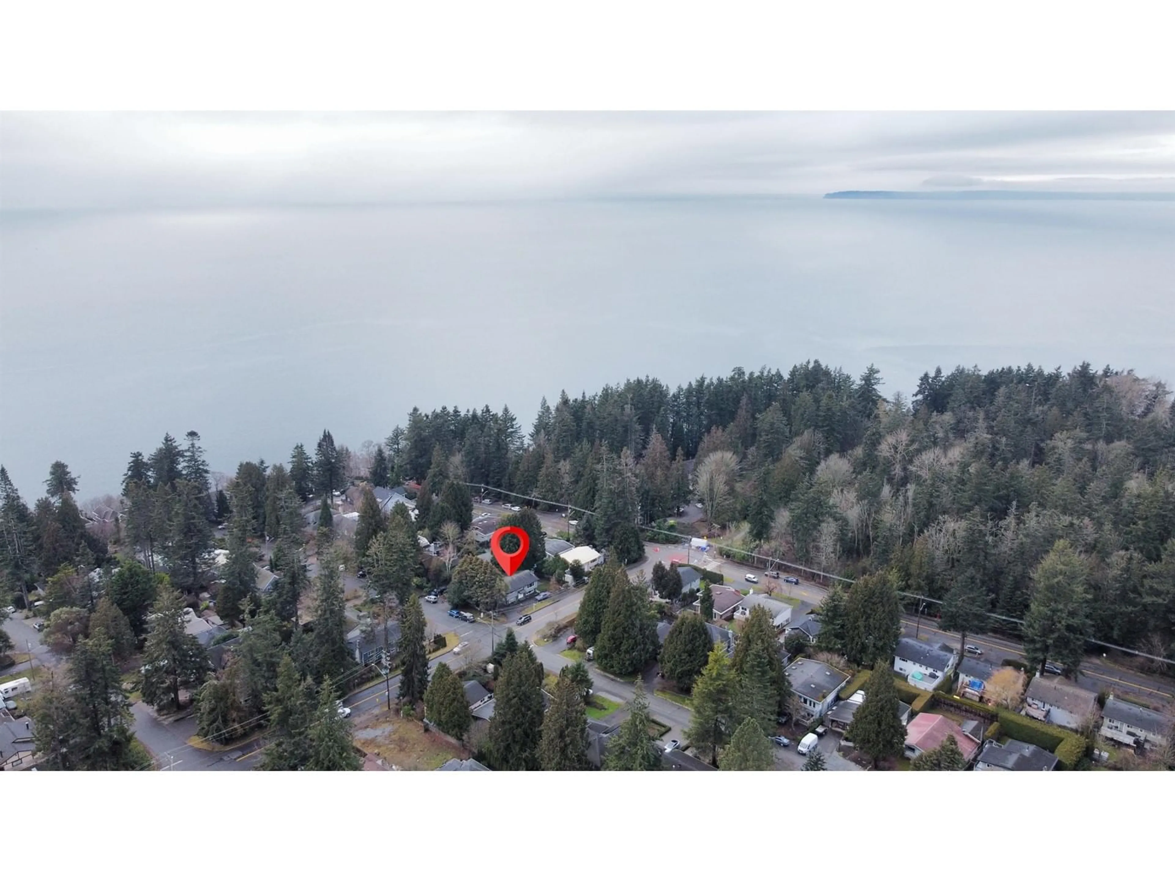 A pic from outside/outdoor area/front of a property/back of a property/a pic from drone, water/lake/river/ocean view for 12828 MARINE DRIVE, Surrey British Columbia V4A1C6