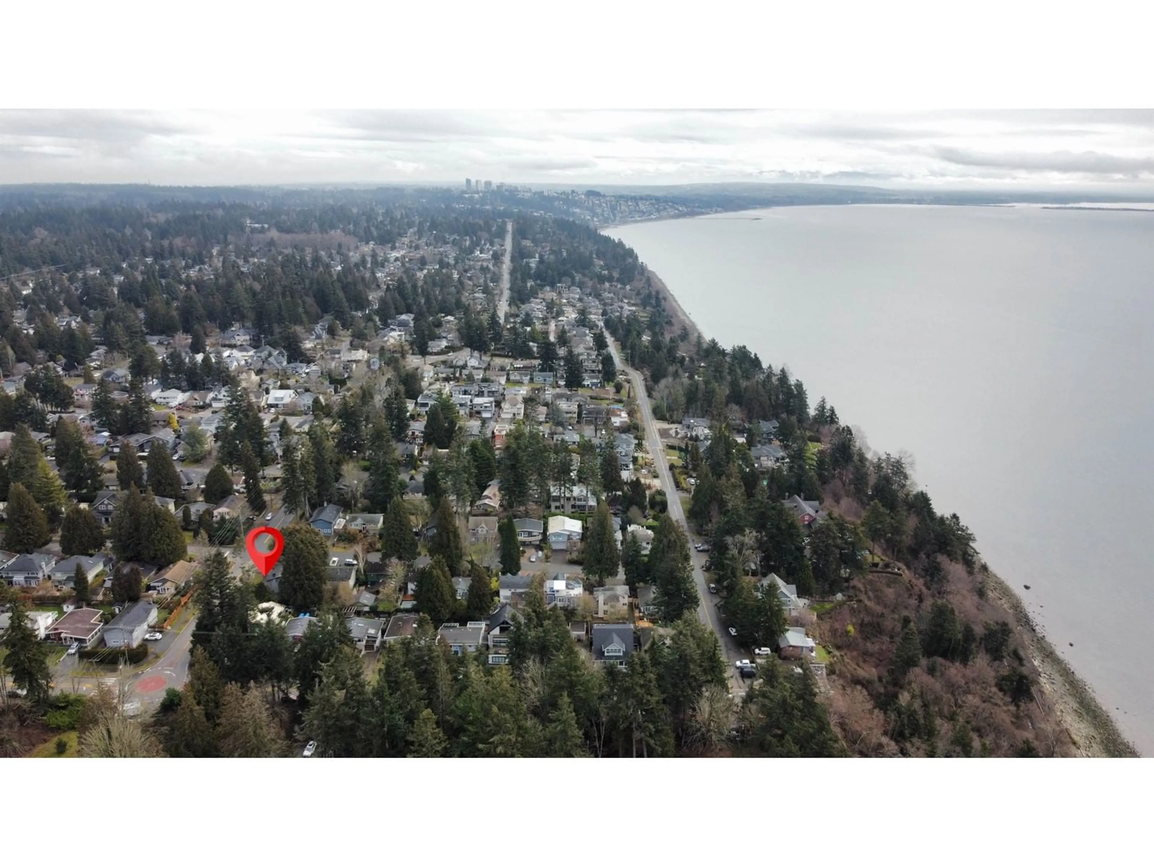 A pic from outside/outdoor area/front of a property/back of a property/a pic from drone, water/lake/river/ocean view for 12828 MARINE DRIVE, Surrey British Columbia V4A1C6