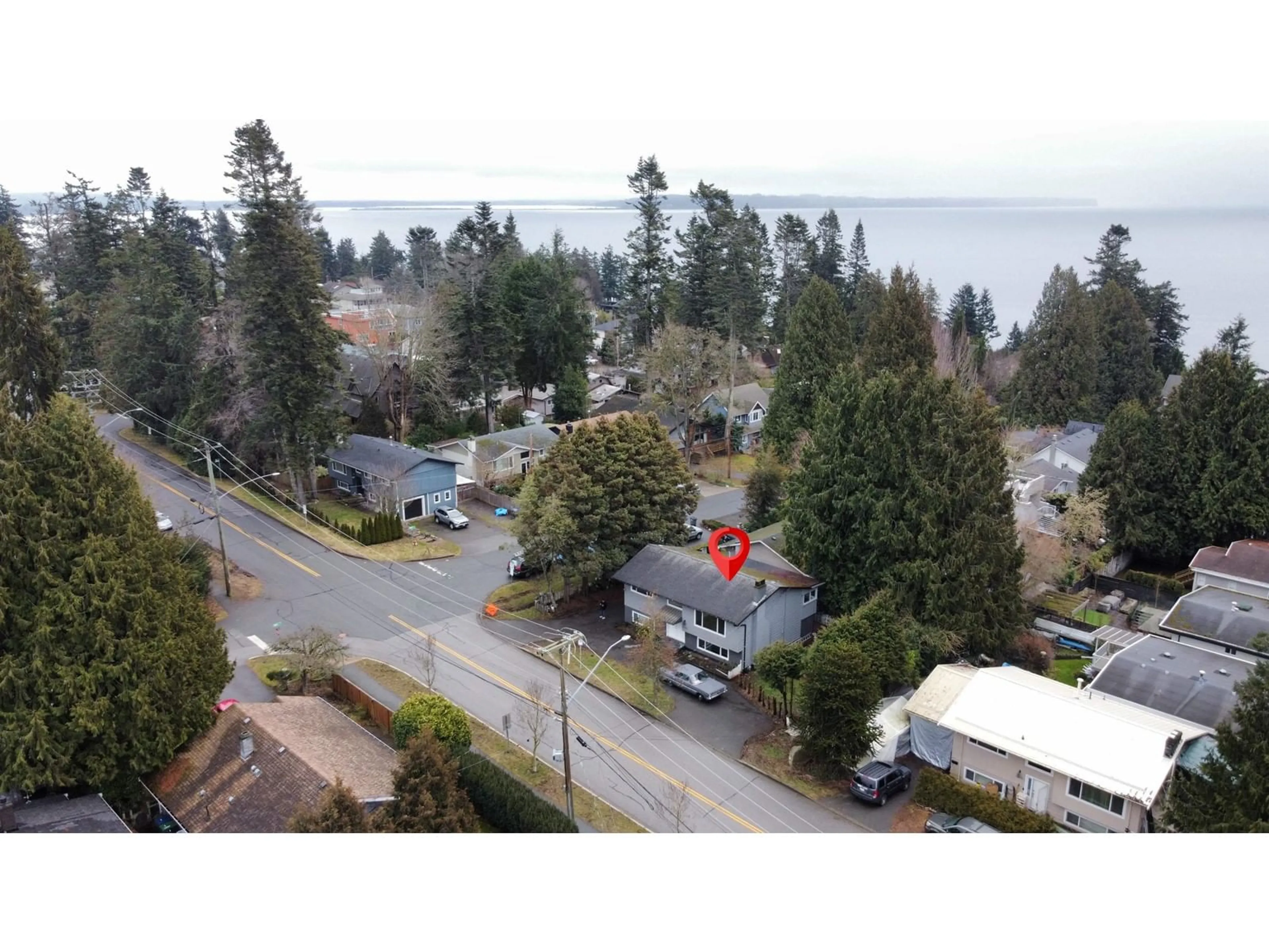 A pic from outside/outdoor area/front of a property/back of a property/a pic from drone, water/lake/river/ocean view for 12828 MARINE DRIVE, Surrey British Columbia V4A1C6